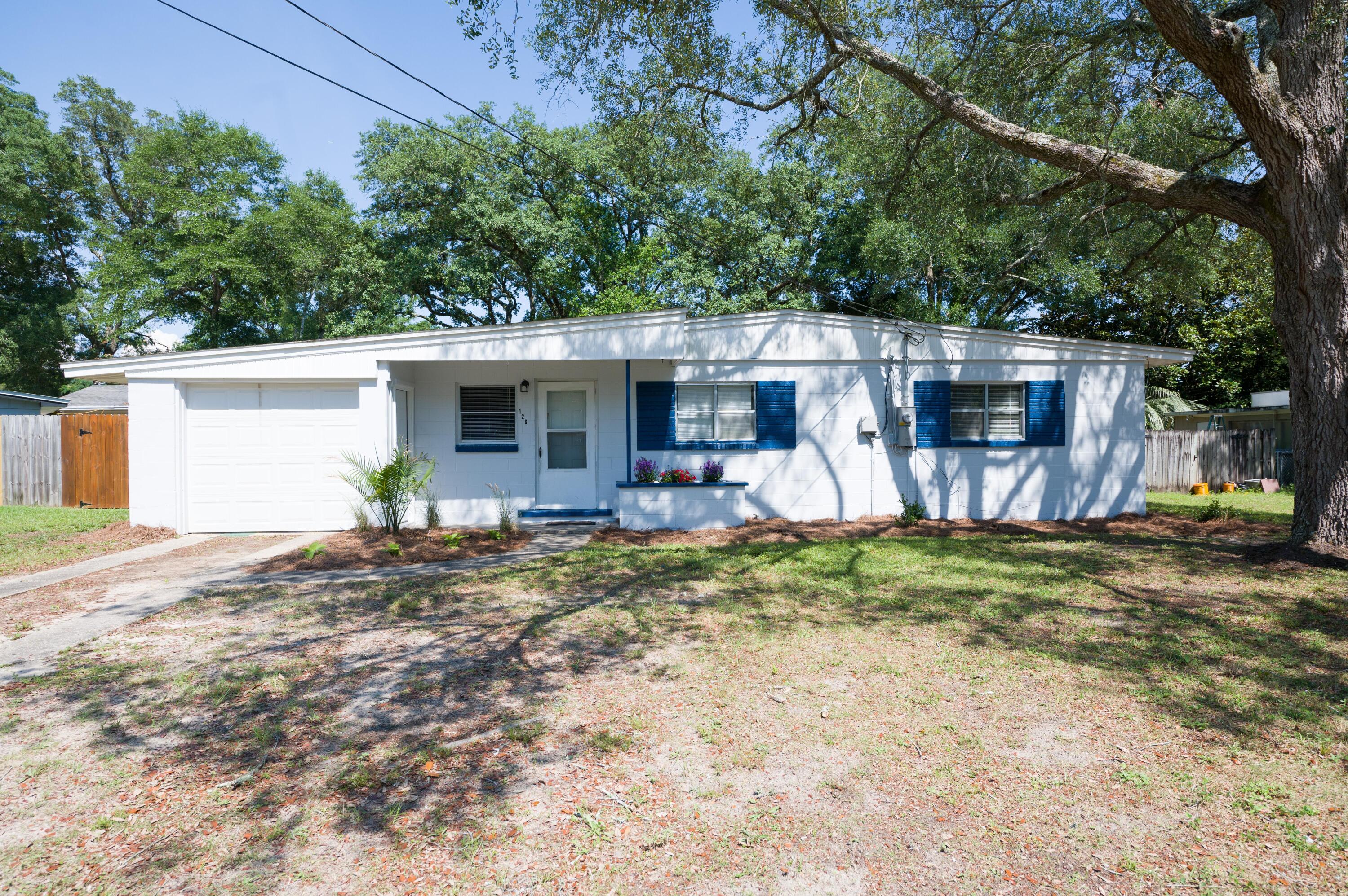 Welcome Home! Centrally located near the center of town with Meigs Park around the block from the home. The roof was replaced in 2019, the water heater 2019, the HVAC system replaced in 2020, interior paint 2022 exterior paint 2022, and new bathroom 2022. The floor plan provides two great living areas and kitchen that is opened to the dining area. The utility closet for your washer and dryer is inside the home. The beautiful remodeled bathroom with tile floors, tile surround, new vanity, and new lightings. The electrical plugs and switches have been updated along with many of the light fixtures and fans. The one car garage is accessible through the brand new door on the porch in addition to the garage door. The back yard has a privacy fence and a small deck off the patio.
