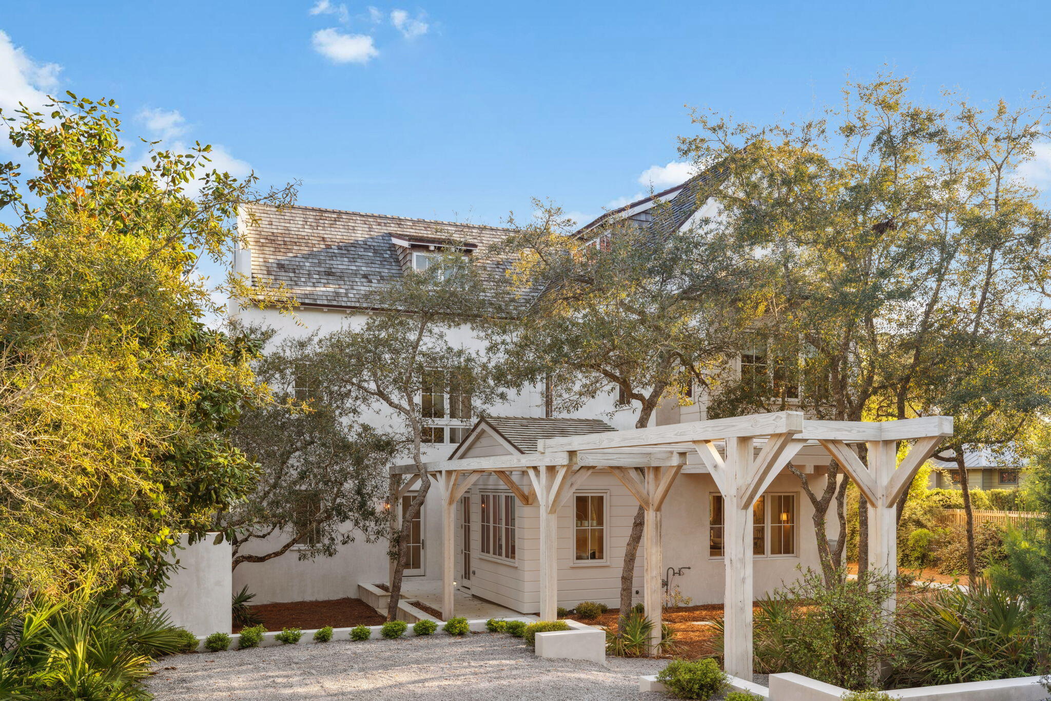 Welcome to 3191 West County Highway 30A, a distinguished property located in the serene setting of Santa Rosa Beach, FL. This 4,283 square foot residence offers a harmonious blend of luxury and comfort, designed to cater to the most discerning tastes. Upon entering this gated estate, you are greeted by a beautifully landscaped yard that sets the tone for the warm and inviting atmosphere within. The first floor features a dreamy kitchen equipped with modern appliances, perfect for culinary enthusiasts. Adjacent to the kitchen is a spacious living room, ideal for entertaining guests or enjoying quiet family evenings. A first-floor bedroom with an en suite provides convenience and privacy, while a half bath adds to the functional layout.
The second floor boasts two generously sized bedrooms, each with its own en suite bathroom, and a comfortable media room that offers additional space for relaxation or entertainment.
The crown jewel of this home is the third-floor master suite, which includes a sitting area currently set up as an artist's studio, offering breathtaking views of the lake. The master bathroom is a sanctuary in itself, featuring a soaking tub, a large walk-in shower, and his and her closets.
Outdoor amenities include a large heated pool and a pool house, providing a perfect setting for outdoor gatherings or leisurely afternoons. The oversized carport is equipped with an electric charging station, catering to modern needs.
This property offers a private and tranquil living experience while being conveniently located near local amenities. Do not miss the opportunity to own this exceptional home in Santa Rosa Beach. Contact us today to schedule a private viewing.