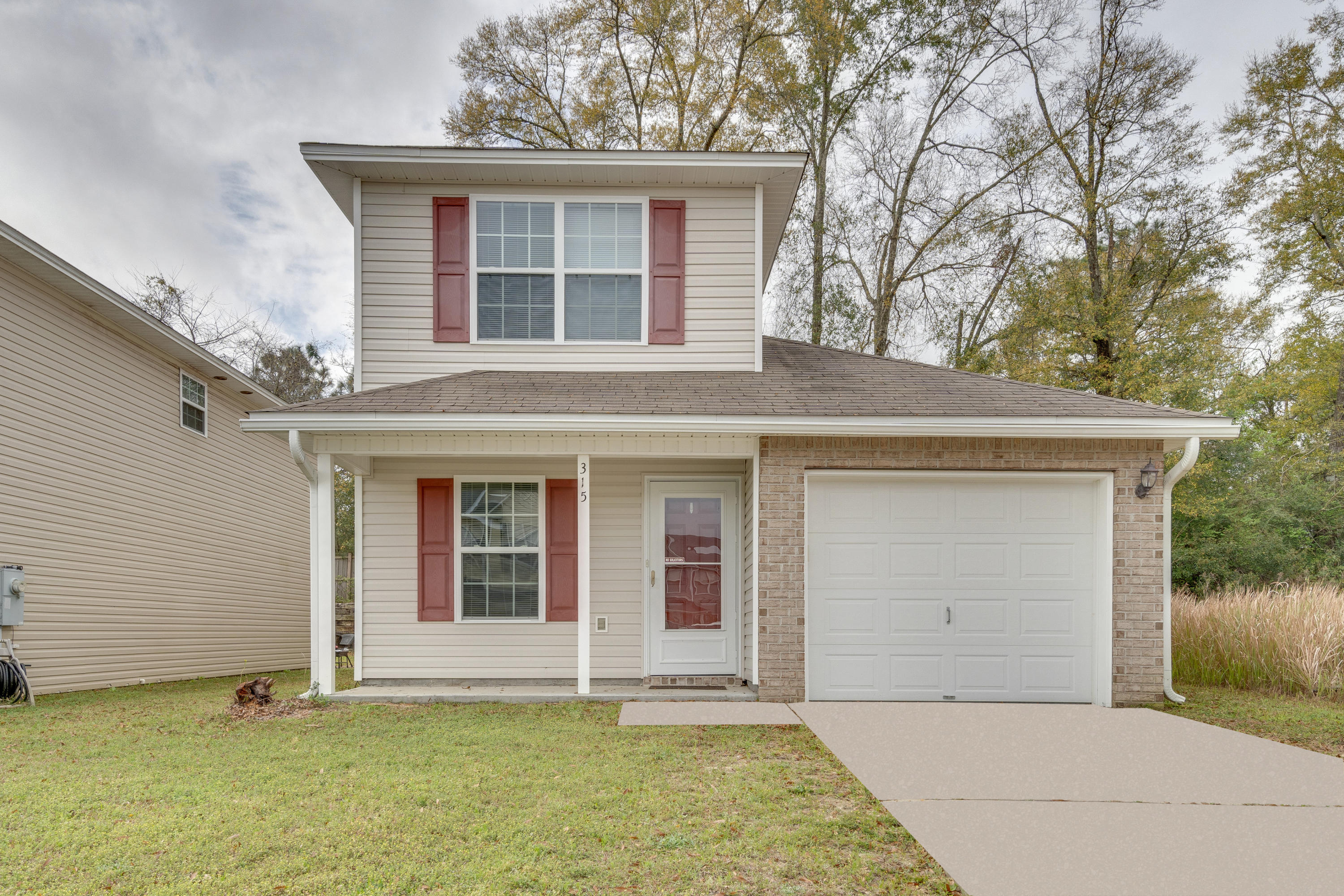 This 1770 SF 4 bedroom, 2.5 bath home is located in Stillwell Estates. As you enter the home you will find a guest bedroom on your left. Moving forward the main living area just opens up to to reveal a spacious living/dining/kitchen area complete with tile floors. The kitchen features plenty of cabinets and workspace with stainless appliances and a breakfast bar. There are French doors just off the living area to step out on the open patio with a fenced backyard. The large master bedroom is located on the main floor and features a walk in closet and master bath complete with double sink vanity and shower. There is also a powder room the and laundry room located on the main level. Upstairs you will find the 2 other bedrooms, guest bath, and a great bonus space perfect for a play area,