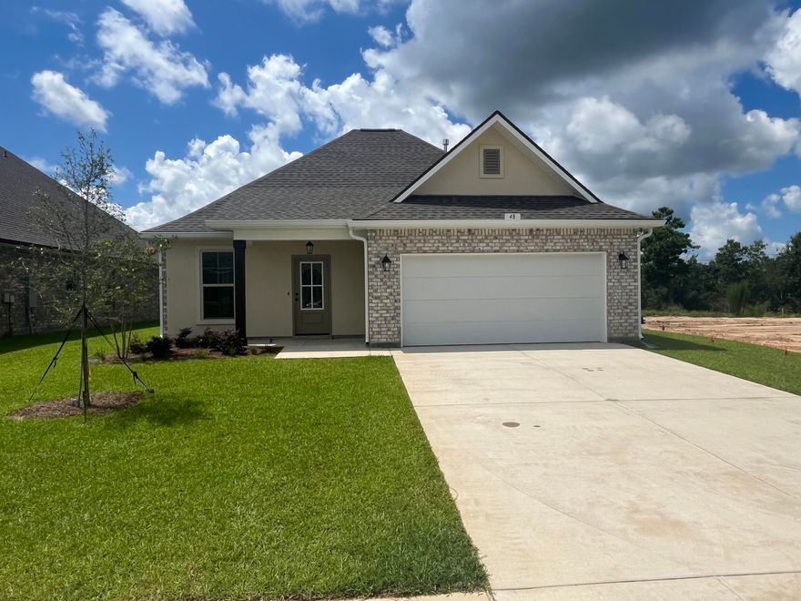 The THOMAS III A in The Bluffs at Lafayette community offers a 4 bedroom, 2.5 bathroom, open design. Upgrades added (list attached). Special Features: double vanity, garden tub, separate shower, and walk-in closet in master suite, kitchen island, walk-in pantry, covered porches, boot bench in mudroom, undermount sinks, LED lighting throughout, crown molding, ceiling fans in living and master, custom framed mirrors in all baths, landscaping, architectural 30-year shingles, flood lights, and more! Energy Efficient Features: tankless gas water heater, gas kitchen appliance package, vinyl low E windows, and more! Energy Star Partner.