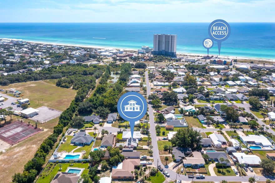 Welcome to 221 Poinsettia a Coastal Charm Just Steps from the Beach! Welcome to this beautifully maintained 2-bedroom, 2-bath home in the sought-after Open Sands community of Panama City Beach. Located just blocks from the white sand beaches and a stone's throw from Pier Park, top-tier shopping, dining, and entertainment are all within easy reach. This home features a desirable split floor plan with tile flooring throughout, perfect for easy coastal living. The kitchen shines with quartz countertops, and the cozy wood-burning fireplace in the living room adds warmth and charm. Step outside to your private, fully fenced backyard--ideal for entertaining or relaxing. Enjoy the benefits of solar panels, a large outdoor shed for storage, and a yard irrigation system to keep the landscape looking its best. Whether you're looking for a full-time residence, vacation home, or investment property, this home has the location and features to impress, call today!