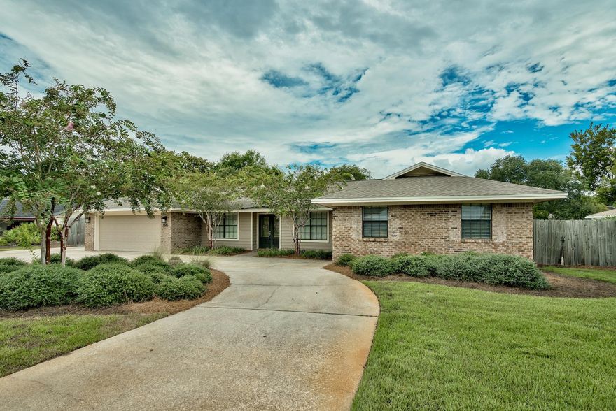 This newly appointed home in the desirable golf course community of Indian Bayou features wood and tile floors throughout the living areas. Its large open kitchen is adjacent to the dining room and expansive living area. The kitchen boasts stainless steel appliances and solid wood cabinets, and large breakfast bar. The living room has vaulted ceiling and brick fireplace and opens onto the tiled patio. The master bedroom has a walk-in closet and its own bath with tub & shower combo and large vanity. The two additional guest bedrooms provide plenty of space along with an additional full bathroom. This home is situated on a large fenced in lot with a tiled patio and plenty of room to add a pool. It's all one level and across the street from the golf course.