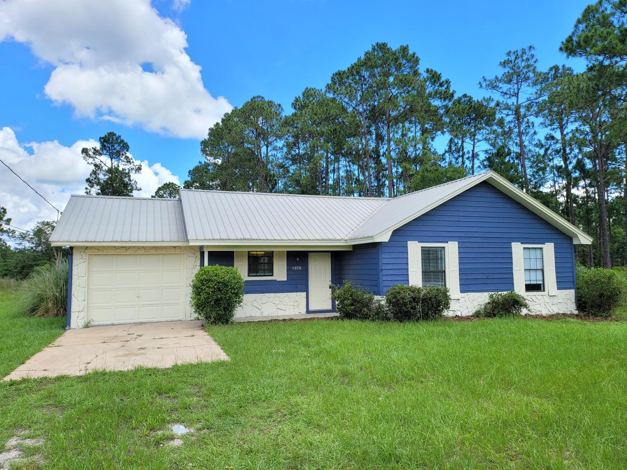 Welcome home! Adorable 3 bedroom 2 bath home nestled on a huge .63 acre lot, backed up to Imperial Lakes! Metal roof. Fireplace. Open living/dining/kitchen combo with new granite countertops. Breakfast bar. Fresh paint. New appliances. Tile floors throughout. One car garage. Large back porch, perfect for entertaining. HUGE back yard, pavilion, and fishing dock! This picture perfect home is ready for its new owners! Vacant and easy to show.