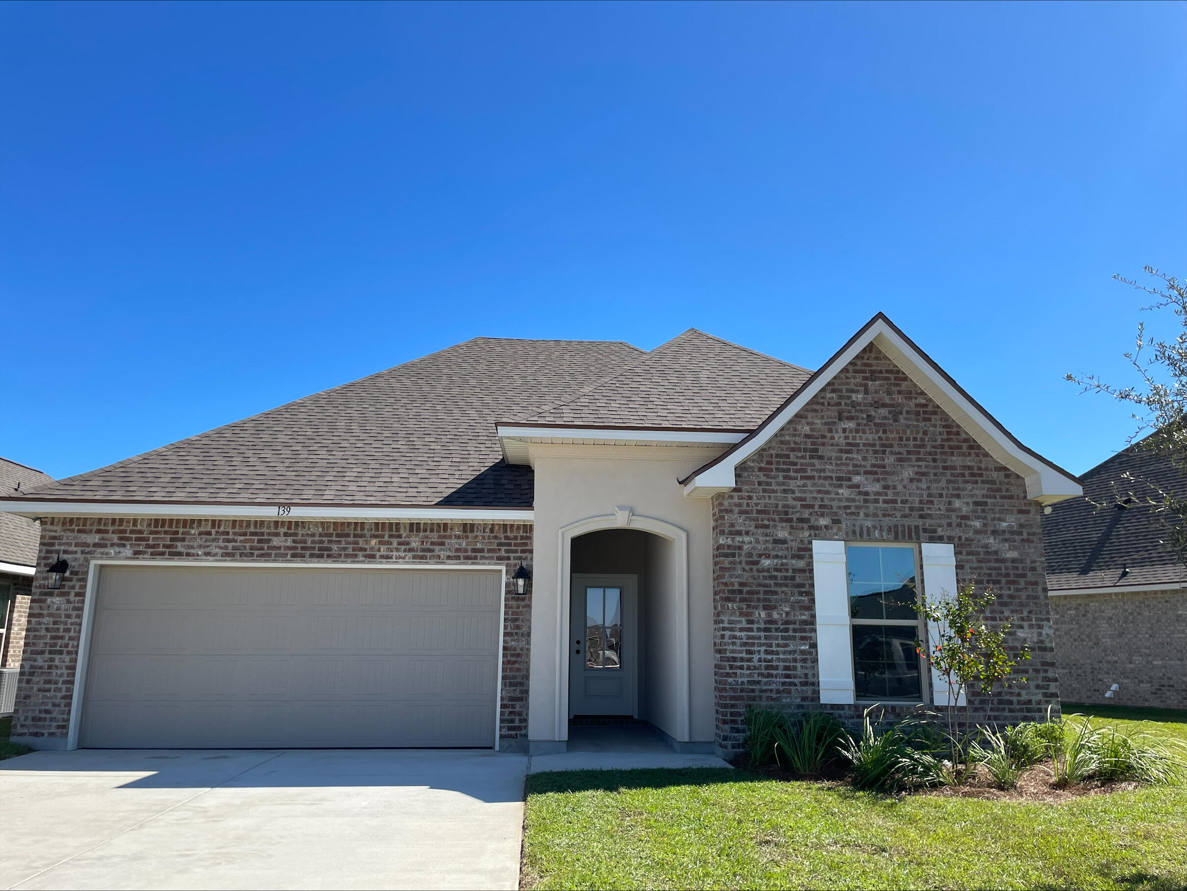 Awesome builder rate + choose TWO free: front gutters, refrigerator, smart home package, or window blinds. Restrictions apply.The TRILLIUM IV A in The Bluffs at Lafayette community offers a 3 bedroom, 2 full bathroom open and split design. Upgrades added (list attached).Special Features: double vanity, garden tub, separate shower, and walk-in closet in master suite, kitchen island, walk-in pantry, covered front and rear porch, boot bench in mudroom, recessed lights, crown molding, ceiling fan in living and master, custom framed mirrors in bathrooms, undermount sinks, landscaping, architectural 30-year shingles, flood lights, and more!Energy Efficient Features: tankless gas water heater, kitchen appliance package with gas range, vinyl low E windows, and more! Energy Star Partner.