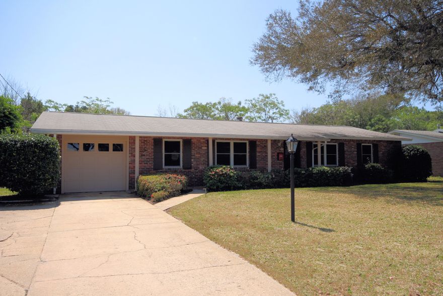 ACCEPTED CONTRACT W 72HR KICK OUT CLAUSE; SELLER ACCEPTING BACK UP OFFERS. PRICE REDUCTION!! Lovingly cared for home in central Ft Walton Beach with a city park just steps away. Beautifully refinished parquet flooring in main living areas, 2 bedrooms and den; tile floors in kitchen, family room. High impact doors and windows provide energy efficiency. Gunite pool with diving board is 16x34. There's a shed/workshop in the back (with power) with additional space for yard equipment/supplies. Shed conveys with no value given for total price determination. The yard is just beginning to ''wake up'' and will be in bloom by mid April. A large master bedroom (two walk in closets, one is cedar) was added. The original home is all brick; addition is wood siding.