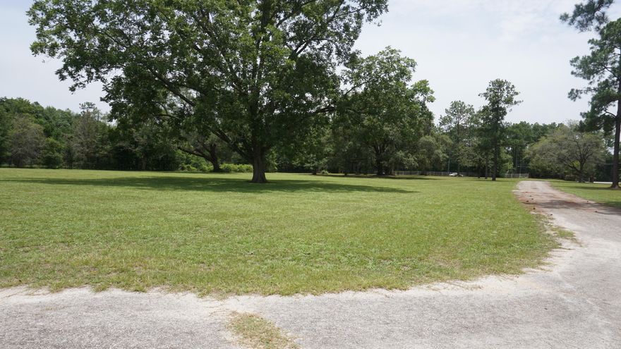 Beautiful vintage country property. 6+ acres nestled just outside the city limits of Crestview. As you enter the property, the long circular driveway leads you past large mature trees straight to a ranch style home. The living/kitchen boasts beautiful wood trim and ceiling that is highlighted with vintage fixtures. A formal dining and 2nd living area is just off the kitchen. To the rear of the home are the 4 bedrooms, built in cabinetry and three bathrooms. This home is equipped with a whole home speaker system with built in record player and a place for an 8 track player. There is a master light switch in the back bedroom that controls all of the lights in the home. The 20X30 Metal Building is large enough to store 8 cars and has a full kitchen, bathroom and entertainment area.