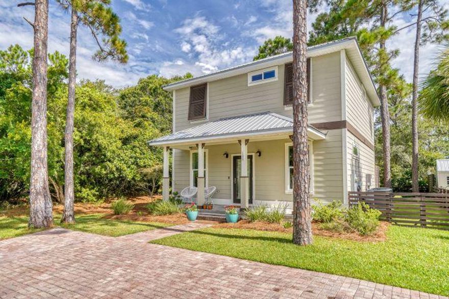 Chic coastal home with high end finishes and expansive backyard conveniently located South of 30A in the highly desirable Blue Mountain Beach neighborhood! Easily walk or bike to multiple public beach access points, nearby boutiques, dining, coffee & ice cream shops. Beside Grayton Beach, Seagrove, Watercolor & Seaside. The home is at the end of the road next to densely wooded areas for added privacy. Stepping in you will first notice this home is expertly designed, decorated and fully furnished, with exclusive Justin Gaffrey artwork alone worth $47k. The open floor plan, living, dining and kitchen areas flow seamless together with an inviting atmosphere. An abundance of natural light brings an airy feel to the entire home. The fenced-in backyard with plenty of green foliage and trees