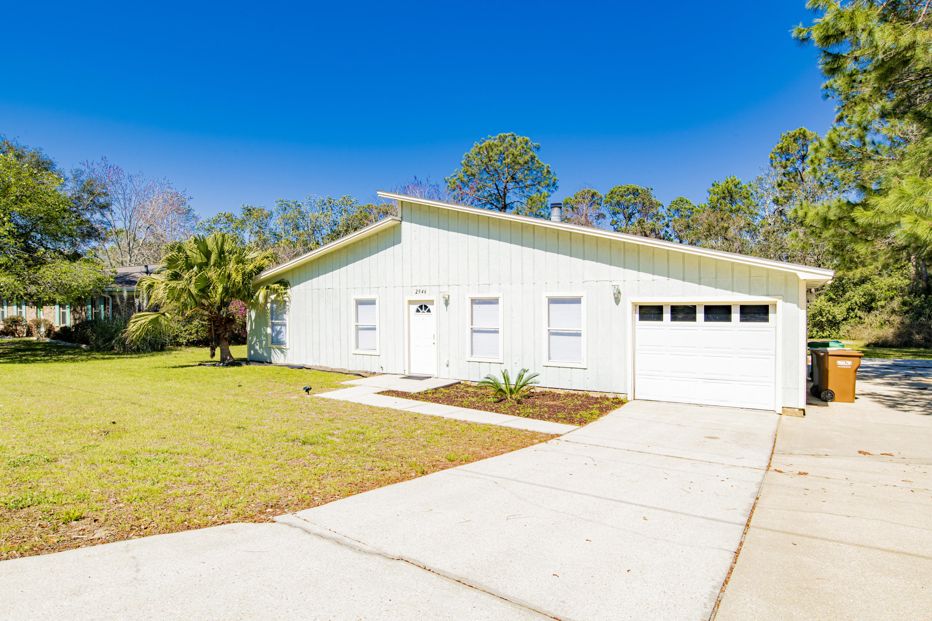 Nestled in the community of Northridge, this 3 bedroom 2 bathroom home resides on an over-sized lot and comes equipped with a side driveway that it suitable to park an RV or large boat with plenty of room accommodate 4 additional vehicles. The back yard offers the perfect entertaining space with a deck expanding the whole length of the house and a sizeable backyard. The galley style kitchen flows nicely into the breakfast nook encompassed by bay windows offering views of the back yard. You'll enjoy the French doors opening to the back deck from the dining room making for a wonderful space for guests to move freely and providing ample natural light into the home. The master suite features a walk-in closet and French doors that open to the back deck as well. Other notables are no HOA, wood b