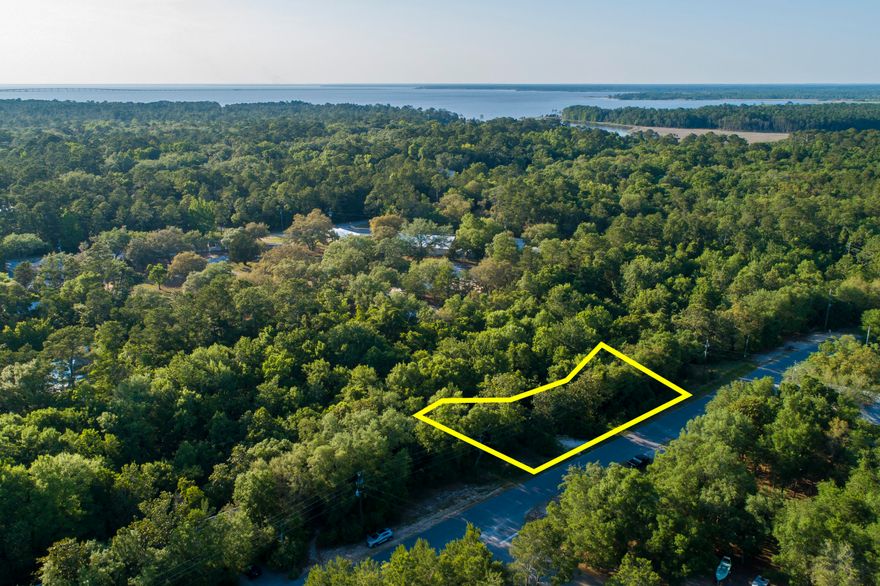 Point Washington has always been a beautiful place and it is quickly becoming one of the most sought after areas in Santa Rosa Beach. This lot is on a quiet street close to the bay. Eden State Park is just a quick walk or bike ride away. South on Hwy 395 takes you right into Seagrove and the beaches of South Walton. Quiet living, yet still close to all of the action 30A has to offer. This sale comes with fully completed architecturally stamped & engineered house plans.