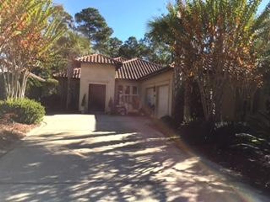 The Vineyards is a delightful neighborhood with old world style villas. Built in 2003 this home has stainless steel appliances, granite counter tops, travertine floors, high ceilings and a gas fireplace. It has a split bedroom open great room and dining area, along with a 2 car garage and an in ground pool. Golf carts are the best way to travel in Sandestin. Run under the tunnel at 98 and you are at the beach, over to the Village of Baytowne Wharf to eat and shop. Publix, and the Grand Boulevard with all of its shops and restaurants, are golf cart accessible. You can even go to the bank or the hospital. This is a great permanent home or second home. It can be rented long term and has had the same tenant for 5 years. Homeowners fees are moderate and include security, daily garbage pick