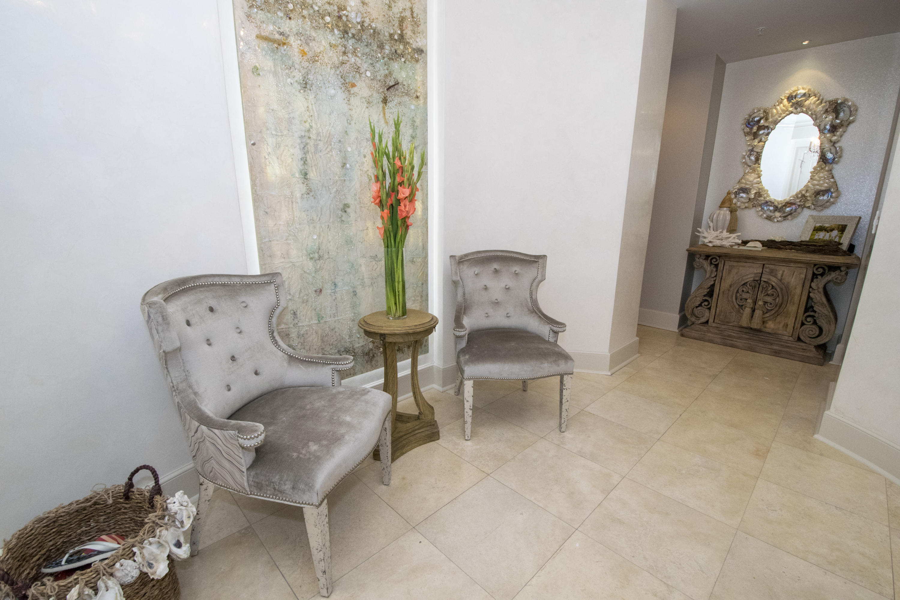 This is the most stunning condominium residence available on 30A. This gorgeous top floor home offers luxury and comfort with an open flow for living at the beach. THIS HOME IS A MUST SEE !! From the moment you enter, you will be in awe of the thoughtfulness and beauty it offers. Direct Gulf-Front and lake views from the living room, kitchen, dining room, and master bedroom and bath. This home has been fully renovated and professionally decorated by Lovelace Interiors, the owners have spared no expense in their attention to details. The home features four bedrooms, four baths 10 foot ceilings, a fabulous chef's kitchen with top of the line Viking appliances and birchwood custom cabinetry. The exquisite kitchen ceiling, backsplash and wall to separate bar area are adorned with hand