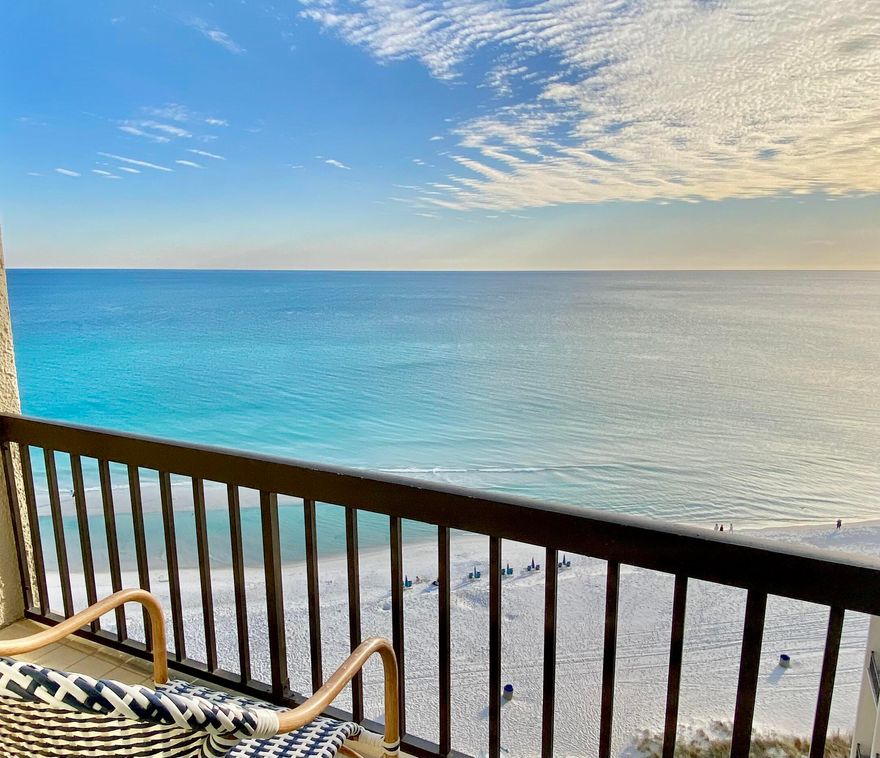 Imagine life in this south-facing fully furnished penthouse unit, enjoying direct gulf and lake views from the living room and balconies. LVT floors flow through the bright open living space which incorporates a kitchen, dining area and a spacious sitting area. However, it's the stunning gulf views that draw the eye from the moment you walk inside. The newly updated kitchen has pristine white cabinets, a blue mosaic tile backsplash and stainless appliances. Beyond the quartz-topped bar, there's a dining area and several windows casting daylight across the room. Sliding glass doors open onto the balcony with the ultimate views of the white sandy beach and emerald gulf. Two bedrooms are complemented by two bathrooms with a washer-dryer in the half bathroom. The guest bedroom boasts