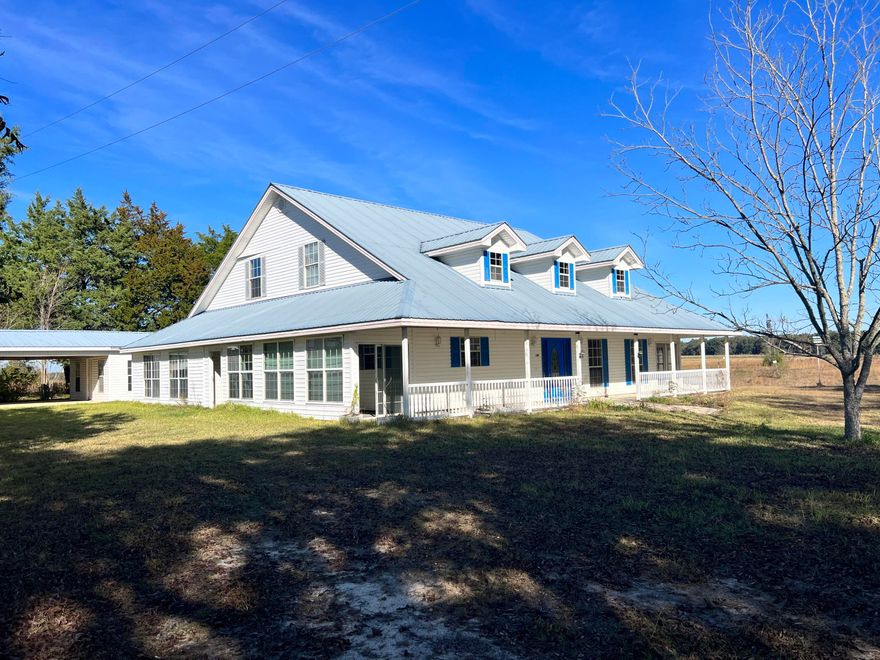 Beautiful newly remodeled home in Laurel Hill.  2 acres included in the rental, but surrounded by another 20!  Great workshop area off the carport.