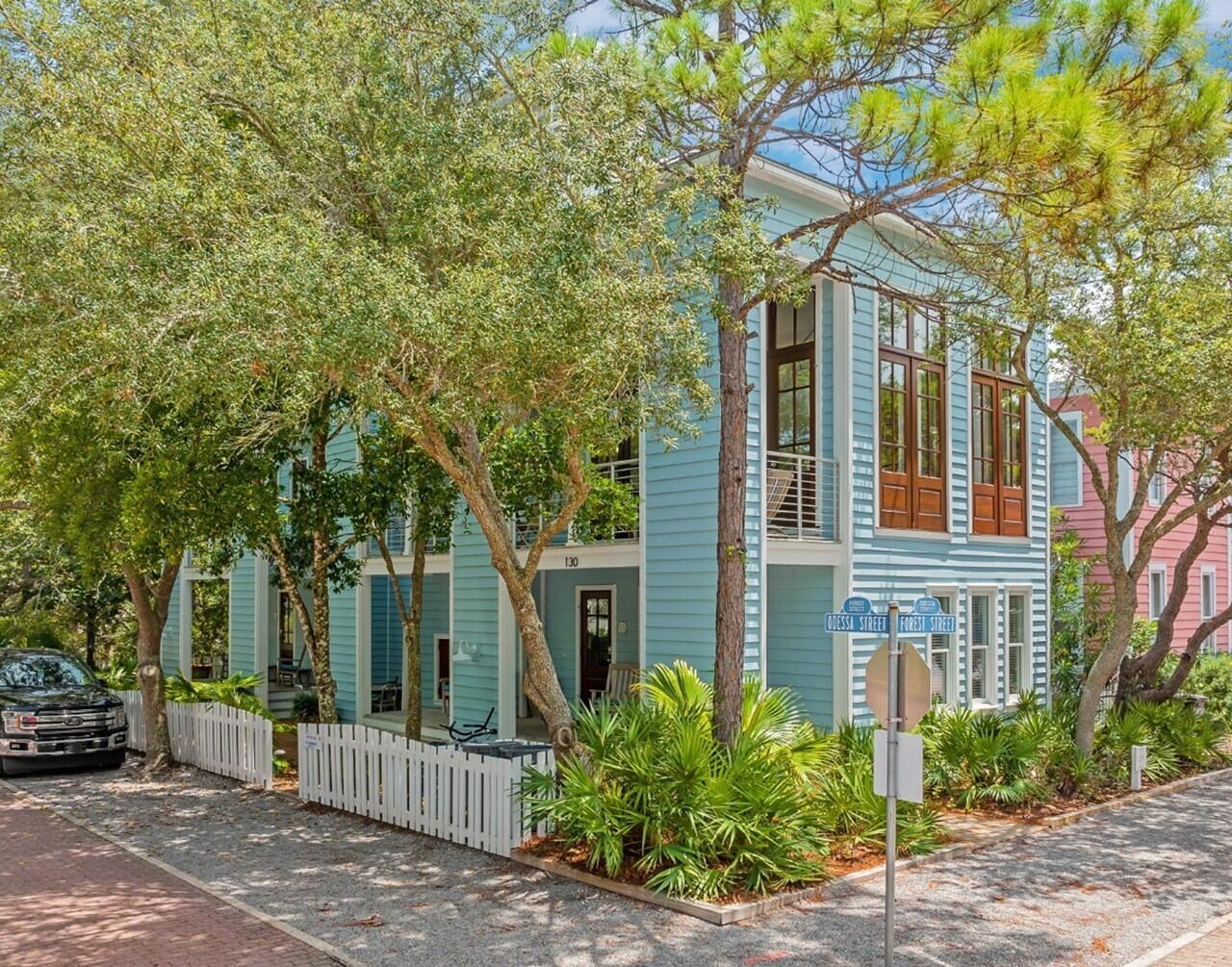 Take a Charleston-inspired home, build it in one of the most prestigious, award-winning communities along 30A, position it in a desirable location in the town, and you'll find ''Just for Fun!'' This impressive home is a modern take on the Charleston design with its many generous porches, beautifully landscaped side yard and plenty of privacy. With a commanding presence on the corner of Odessa and Forest Streets the location accommodates parking on the west and south sides. Because Odessa Street dead-ends next to the house, you have an extra feeling of privacy with no neighbor next door and no traffic on side street. The home is near the west-end family pool and just a quick stroll to the beach, making this a preferred location for families. The first level of the main house offers two king primary bedrooms, both with en-suite baths that ensure privacy for you and your guests. The second-floor surprises you with a grand living room topped by a soaring ceiling height, providing an incredible sense of spaciousness and plenty of natural light. Throw open the French doors onto the side porch and expand the living area, blending indoor and outdoor spaces seamlessly. The kitchen strikes a modern vibe, showcasing new quartz countertops and high-end stainless-steel appliances - Viking gas range, Liebherr refrigerator, Bosch dishwasher, and built-in Sharp microwave. Off the kitchen, a new half bath and laundry area was recently added. At this level, the main and guest quarters connect for extended family. The third floor offers a third bedroom with en-suite bath and a spacious sleeping loft for the kiddos. There is also a large owner's closet on this level. Another set of stairs leads to a roof top sun deck and then up to a covered tower to enjoy the most spectacular sunsets and gulf views! The entire home has recently undergone a total renovation. The guest quarters can be locked off from the main house and provides a full kitchen, living/dining and full bath on first level and a bedroom with en-suite bath, sleeping loft and spacious porch on the second level. Dining al fresco is made possible by the fabulous patio connecting both cottages. All you need are your swimsuits and beach towels and you'll be ready to enjoy Just For Fun.