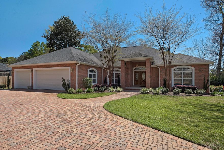 Built in 2005 and situated at the end of a private drive on a -1/2 acre lot, this exquisite, expansive 5-bedroom, 4-bathroom estate offers the best of Bluewater Bay with NO HOA fees or restrictions! Enjoy unparalleled quality of life in nearly 3400 square feet of well-designed, single-story, quality-built living space complete with gracious covered porch and gorgeous enclosed Grecian-style POOL and SPA. The open concept floor plan seamlessly connects multiple living spaces, draws in natural light, and is ideal for entertaining! Located just 1/3 mile from Bluewater Bay Marina Complex, bring your boat, paddle boards, kayaks, and more  there's an over-sized 3 CAR GARAGE to accommodate all of your toys! MUST VIEW THE SPECTACULAR 3D RENDERING (IN THE PHOTOS TAB); schedule your appointment T