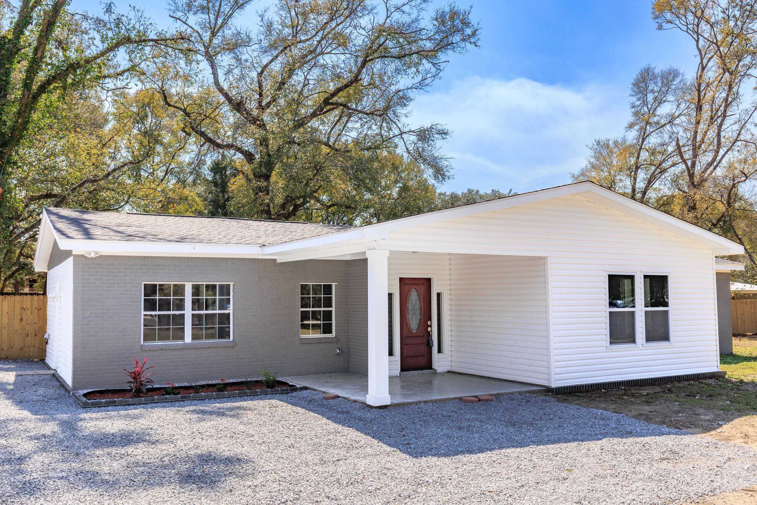 Welcome to this completely remodeled 4-bedroom,2-bathroom home in the heart of Crestview! Offering 1,975 square feet of living space sitting on 0.87-acre lot, this stunning home has been thoughtfully updated from top to bottom. It's the perfect choice for those looking for a move-in-ready home with modern finishes and a spacious layout.Remodeled Kitchen, featuring brand new appliances, cabinets and granite countertops.Enjoy the peace of mind that comes with a new AC system and new hot water heater--both just installed for optimal comfort and efficiency. Newer roof 2022. New LVP and tile flooring, updated A/C Duct system. Schedule your appointment to tour this beautiful recently remodeled Home.
