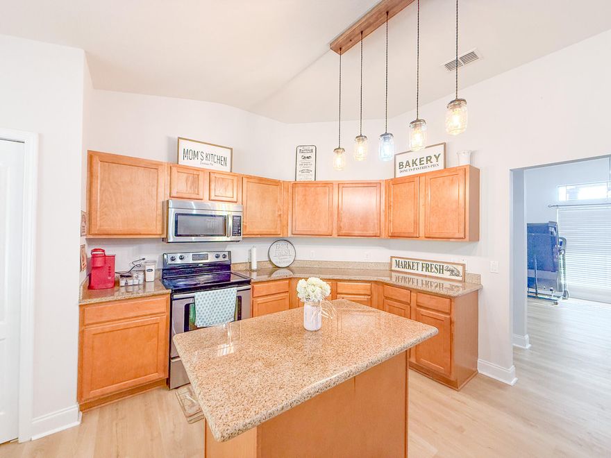 Welcome to 6214 Flash Drive, where comfort, space, and everyday functionality come together in this beautifully refreshed 4-bedroom, 2-bath home located in desirable North Crestview. Offering a peaceful setting with convenient access to town, this home is ideal for buyers seeking room to spread out without sacrificing location.Step inside to find fresh interior paint and new luxury vinyl plank flooring throughout, all in timeless neutral tones that create a clean, modern backdrop ready for your personal style. The spacious living room is centered around a cozy fireplace, making it the perfect place to unwind at the end of the day or gather with family and friends. The kitchen is thoughtfully designed with both style and practicality in mind, featuring granite countertops, ample cabinet space, a breakfast nook, and a separate dining areaperfect for everything from casual mornings to hosting special occasions.

The split floor plan offers privacy and flexibility, with four generously sized bedrooms that can easily accommodate a home office, guest space, or growing household. The primary suite provides a comfortable retreat with an ensuite bath and plenty of room to relax.

Outside, the yard offers a low-maintenance backdrop with opportunities for creative landscaping, terraced garden designs, or custom outdoor spaces, allowing future owners to tailor the exterior to their lifestyle and vision.

With thoughtful updates already completed and a layout designed for everyday living, 6214 Flash Drive is move-in ready and waiting for its next chapter. Schedule your private showing today and see how easily this home fits your life.