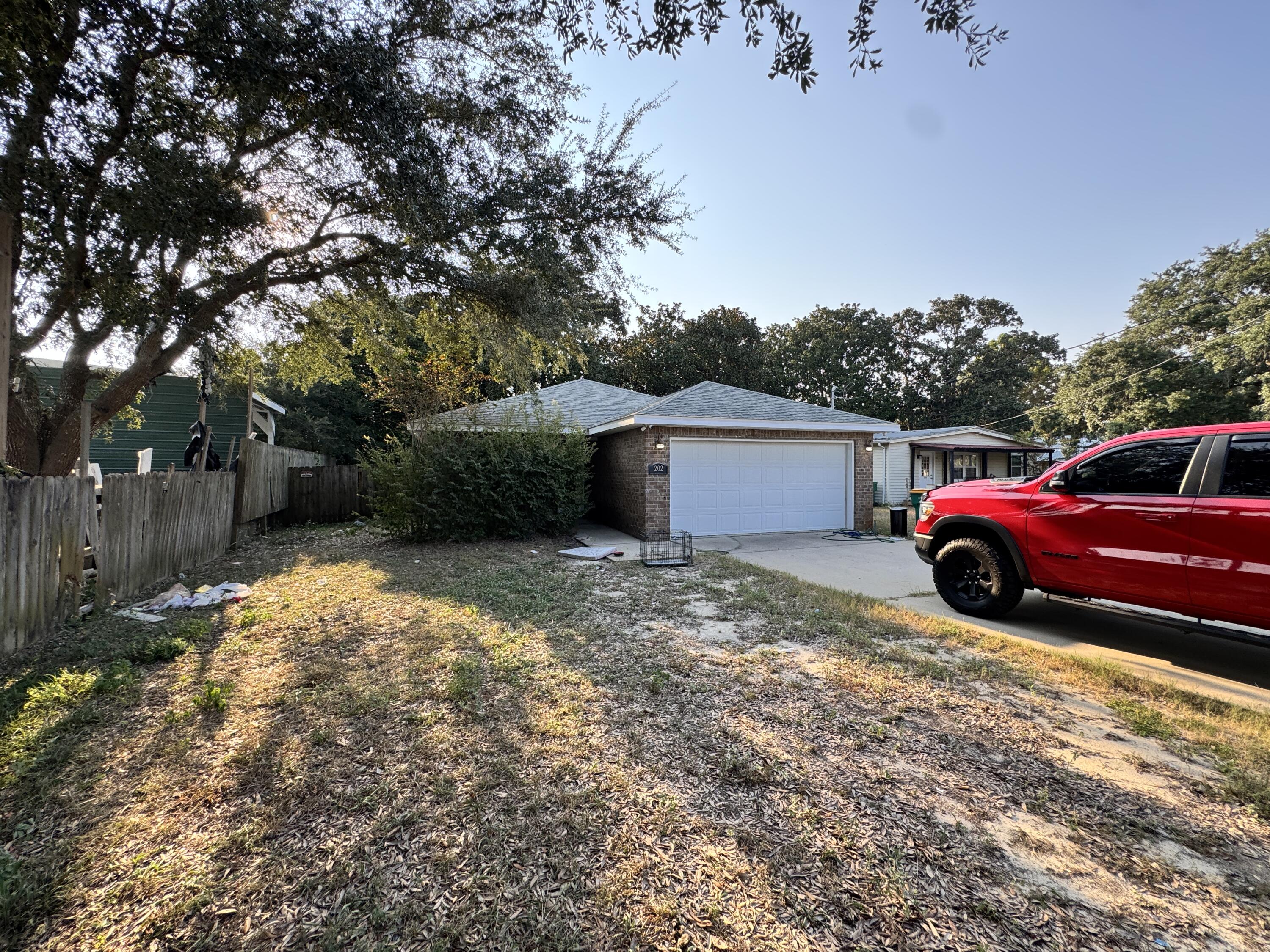 Are you ready to do a Flip? This home needs some love but will be a great Fix and Flip or LTR. Bring a dumpster and start with a clean-out. All-brick, single-story home. Enjoy an open-concept layout featuring a spacious living and dining area. Step out onto the lanai from the living room for added relaxation space. The master suite offers a generous walk-in closet, while two additional bedrooms provide ample space--one also includes a walk-in closet. Convenient indoor laundry room. Attached 2-car garage with automatic opener. Fully fenced backyard. Home will be sold AS-IS.