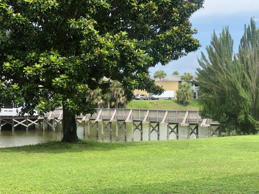 Two bedroom, Two Baths. Beautiful view of the lake. First floor easy access. Tile flooring in the living room. Washer/Dryer hook up. Appliances convey. Porch area tiled. Centrally located in the Heart of Destin. Close to Beaches, Restaurants, Shopping & Entertainment. Amenities include: 3 pools, Tennis, Out Door Grills, Community Room, Buyer to verify any & all dimensions.