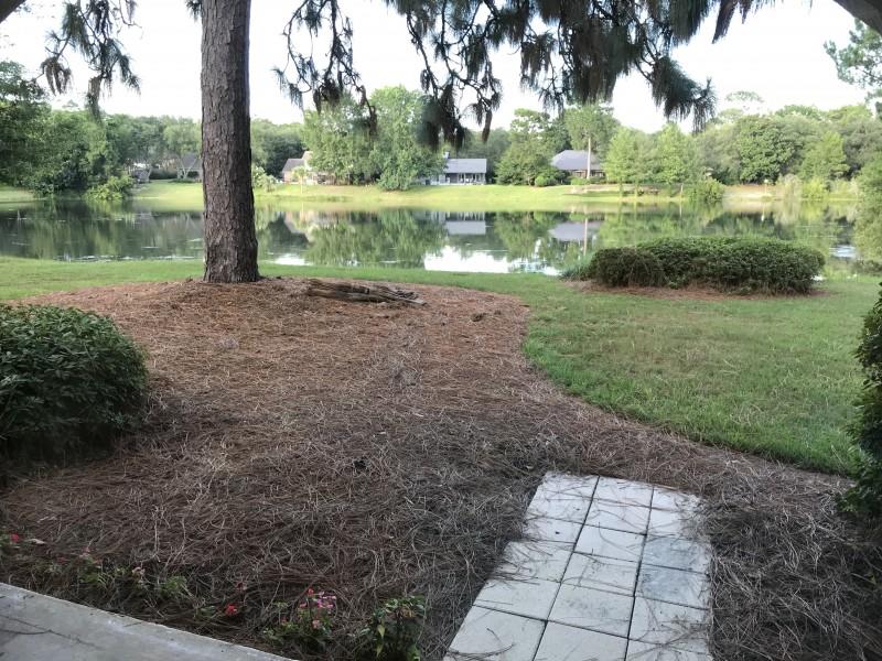 This stunning recently remodeled ground floor one bedroom condo is tucked away in the Lakeside villas enclave of the highly desirable Bluewater Bay.It features a large living room and dining room combo and a covered back porch with relaxing panoramic lakefront views. Full kitchen comes equipped with beautiful granite countertops, matching like-new stainless Kenmore / Frigidaire kitchen appliances, washer-dryer combo, eat-in nook with breakfast bar, perfect for entertaining. Other amenities and features include maintenance-free tile throughout, fresh paint, updated bathroom with Eco-friendly toilet, extra customizable storage-pantry space, and his and her closets.The HOA covers all exterior lawn and building maintenance and includes water, trash, and sewer. Tennis courts and the