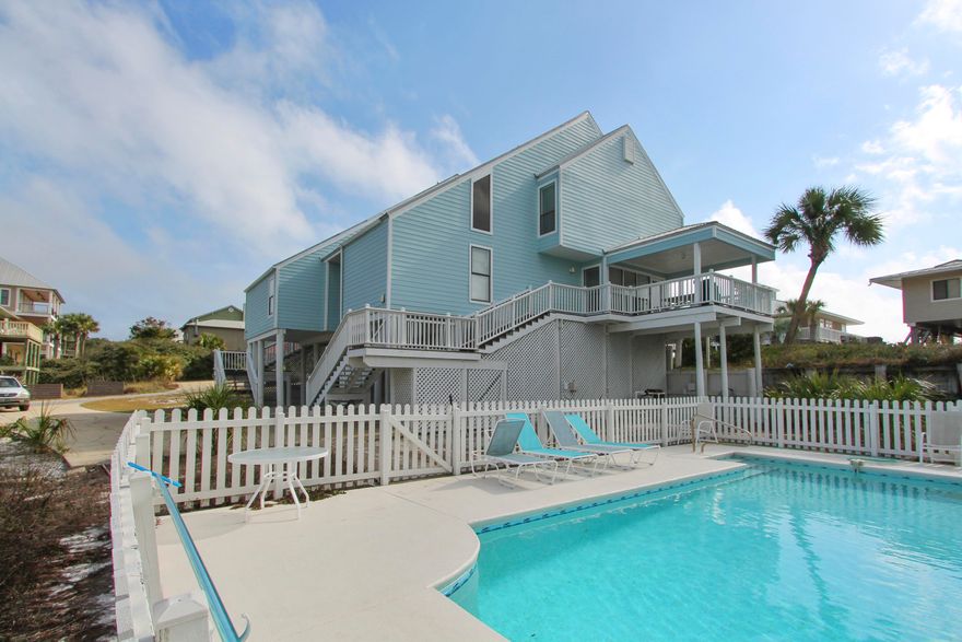 This property is a duplex with the same owner of both units ! Fantastic location one lot removed from the beach and with tremendous ocean views from every room.West side is 4 bdrm/ 2 1/2 bath and the East side is 2 bdrm/ 2 bath. Nice private pool compliments this excellent property. Beach access is apprx. 100 steps away.