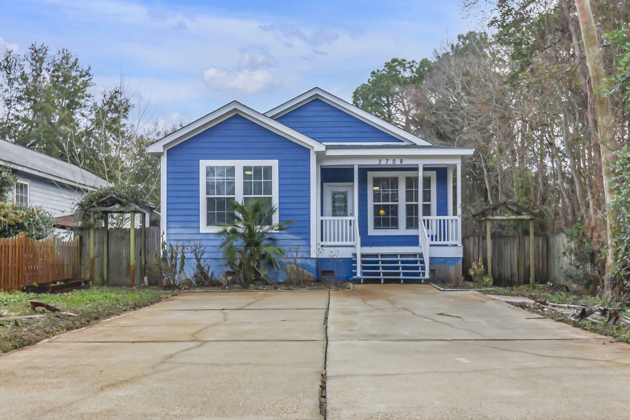 Charming 3-bedroom, 2-bath home just steps away from Joe's Bayou Recreation Area and Mattie Kelly Pier. Enjoy relaxing on the covered front and back porches, with added convenience of a storage building in the private, fenced backyard. Inside, you'll find fresh neutral paint, tile flooring throughout (no carpet), modern lighting, and tasteful upgrades. The spacious living room flows into the kitchen, which features stunning countertops, subway tile backsplash, stainless steel appliances, abundant cabinet space, and a formal dining area. The master suite includes an en suite bathroom with double vanity, walk-in shower, garden tub, separate toilet room, and a large walk-in closet. The two guest bedrooms share a full guest bath. Additional amenities include a mud room and laundry room. Pets may be considered with prior approval and a non-refundable pet fee. No smoking or vaping allowed.