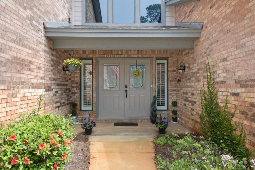 This fully renovated all brick one story home in Bluewater Bay is waiting for you. With 3 oversized bedrooms, 2.5 updated baths, an amazing sunroom with lots of possibilities and golf course views, make this home perfect. The wood work throughout shows the care that has been taken to make it feel warm. The very large master suite has an amazing bathroom with 2 walk-in closets just past the double doors with a slipper tub, beautiful tiled shower with amazing light shining in (a must see). The kitchen was designed in gorgeous detail to include a built in desk, lots of cabinetry, quartz countertops and amazing walk-in pantry.  Unexpected military orders made this your opportunity to get the perfect home. A new tankless water heater and HVAC also installed in 2014 along with a new roof. The garage has tons of cabinet storage to put away all your goods. This home is a must see.