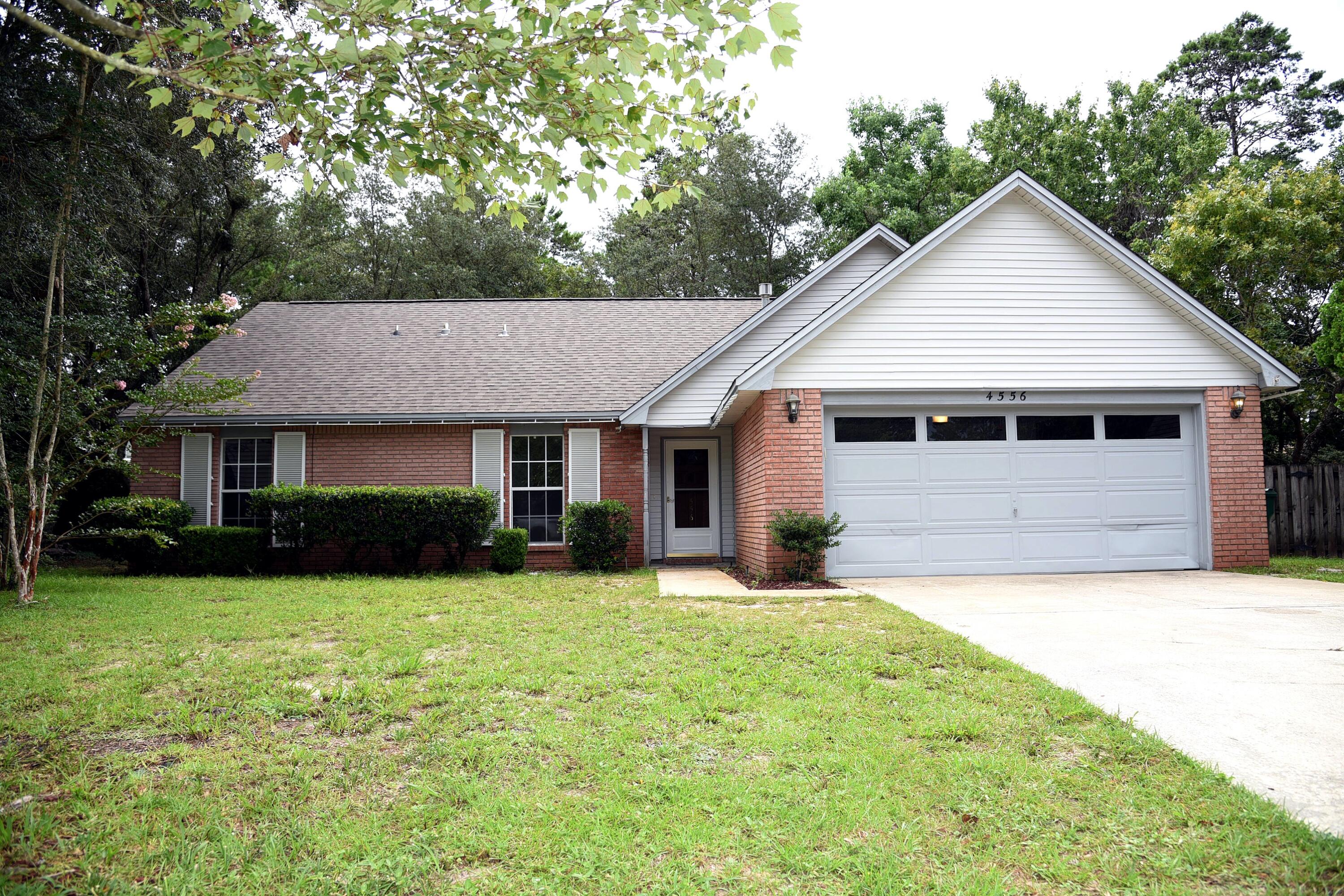 Welcome to this 4 bedroom, 3 bathroom home in the desirable area of Bluewater Bay in Niceville. This spacious property features a modern walk-in shower, ample walk-in closets, and a large yard perfect for outdoor activities. With the convenience of included lawn service, you can spend more time enjoying your new home and less time on maintenance. Don't miss out on the opportunity to make this house your own in this sought-after location.