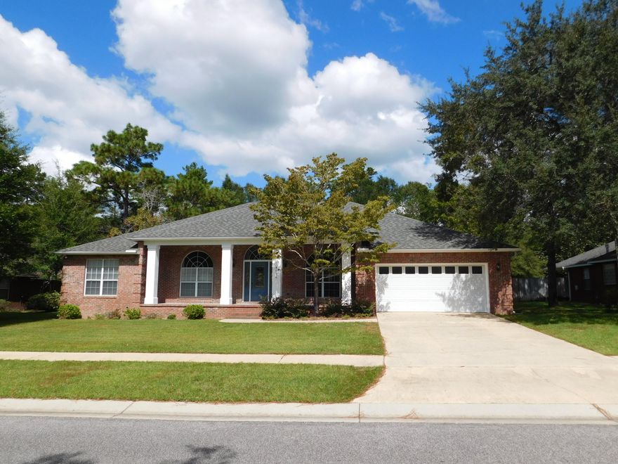 Hurry before this great home is sold! Located in one of the nicest neighborhoods in Rocky Bayou. You are greeted at this home by a large front porch. Home has been tastefully updated, to include crown molding, wood floors, granite countertops, and stainless-steel GE appliances. Stove hasn't even been used. You have 10 ft. ceilings in the main section of this home and 2 living areas. Wonderful master suite with large walk-in closet in master bath. Split bedroom home, offers three additional bedrooms with 2 full bathrooms. Large kitchen with island, breakfast bar, granite countertops, lots of counter space, pantry and breakfast nook. Spacious laundry room has extra cabinets and large counter to fold your clothes on. Other updates are new lighting and new paint.