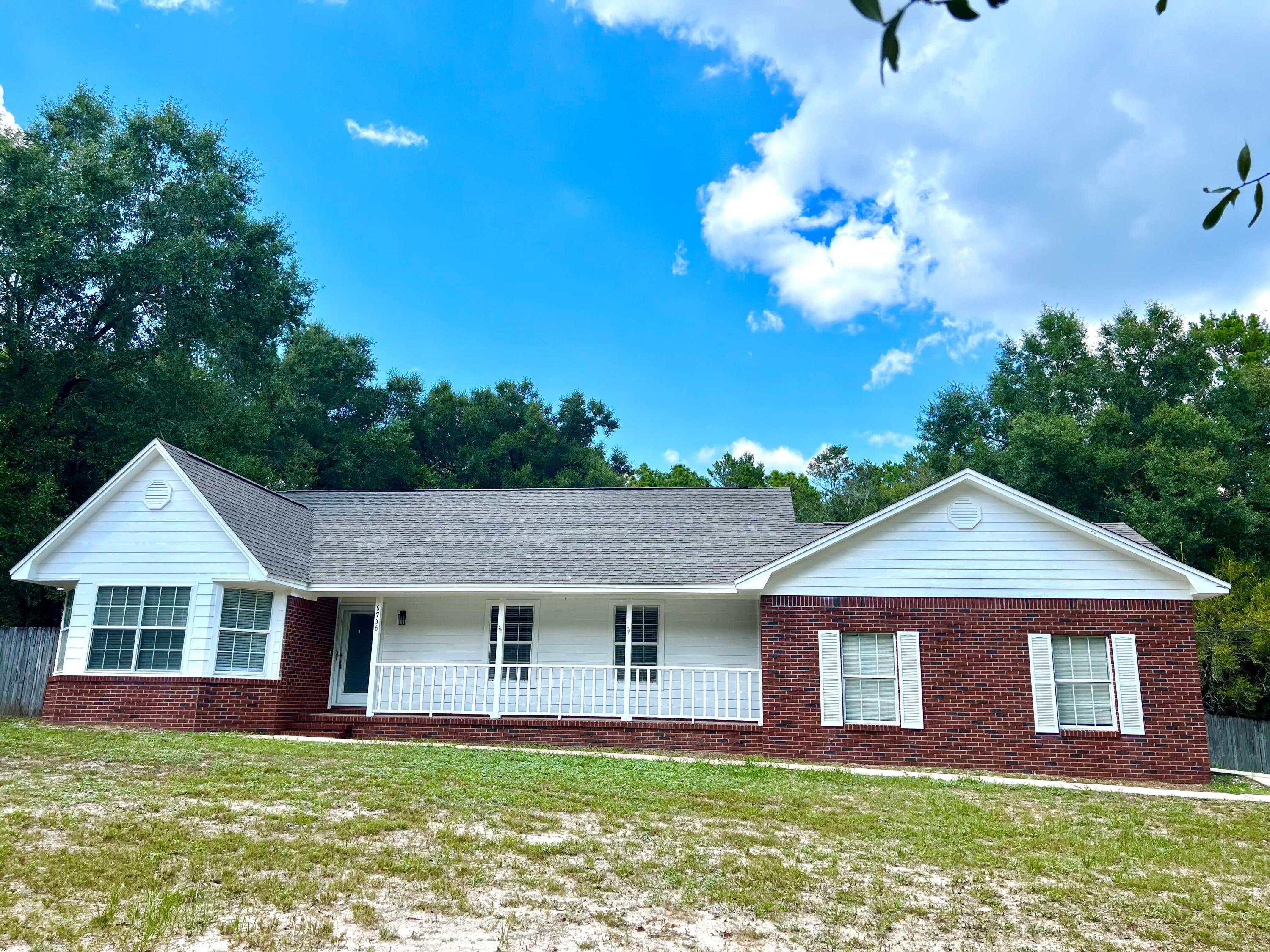 The feel of country living, near the city! This home features ceramic tile flooring in many areas of the home, laminate flooring and crown molding. The kitchen includes a breakfast bar, pantry, tile backsplash, maple cabinets, and recessed lighting. There's a large, covered patio and French doors that lead to the outside. All on nearly an acre of land.