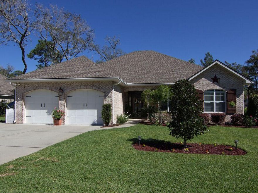 This STUNNING 3BD/2BA home in sought-after Magnolia Woods is practically new!Built in 2012, the open floor plan features 8' doorways, maple wood flooring in the living room, kitchen, dining room, and all 3 bdrms. Enter your new office through beautiful natural wood-stained French doors. Granite countertops with chestnut cabinetry in the kitchen (EZ close hardware and pulls), and stainless steel appliances. Add'l features include a gas fireplace, prewiring for surround sound and crown molding in the main living areas. Master bathroom features an elegant tiled, walk-in shower with Rain shower head plus add'l handheld. Double granite vanity and tile flooring. Through the screened-in porch, you NEW 25 x 30 ft salt water POOL awaits! Zoned for A+ schools and close to the beaches of Destin!