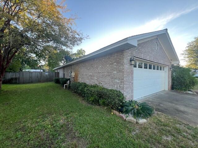 This fantastic 3-bedroom home is nicely furnished & offers a 2-car garage, fenced back yard for your furry family members, and is perfectly located in a quiet neighborhood just 2 miles from the beach! Pompano Joe's is the closest beach access & can easily be traveled to by golf cart via Holiday Road. Boasting 1,785 sq ft, this home is plenty spacious & was made for entertaining with 2 breakfast bars, 2 dining areas, and an expansive covered patio. The vaulted ceilings & skylights make the home bright & airy. The beautiful kitchen features slate appliances, tile backsplash, granite countertops, and plenty of storage space. There is no carpet which is easy maintenance, ideal for sandy beach living! The spacious master bedroom offers a walk-in closet & a beautifully updated private bathroom.