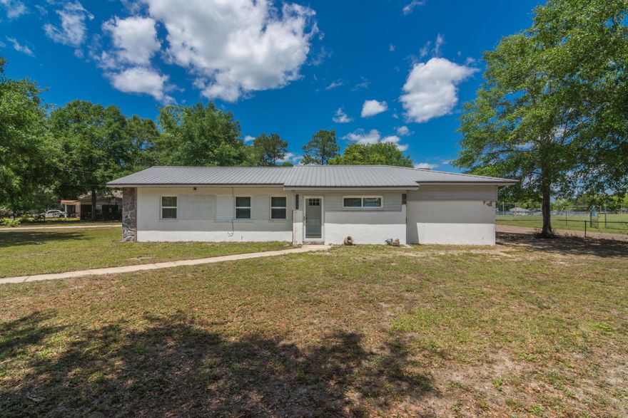 ATTENTION INVESTORS!!!! Two Homes! Great opportunity for possible rental income! One living space has three bedrooms and two full bathrooms plus a bonus room! The other living space has one bedroom and one bathroom with large living area. The home is located on a corner lot on just over a half an acre! Privacy fenced back yard with a large shed. Come check out this unique property today! Listing Agent related to owner of the property.