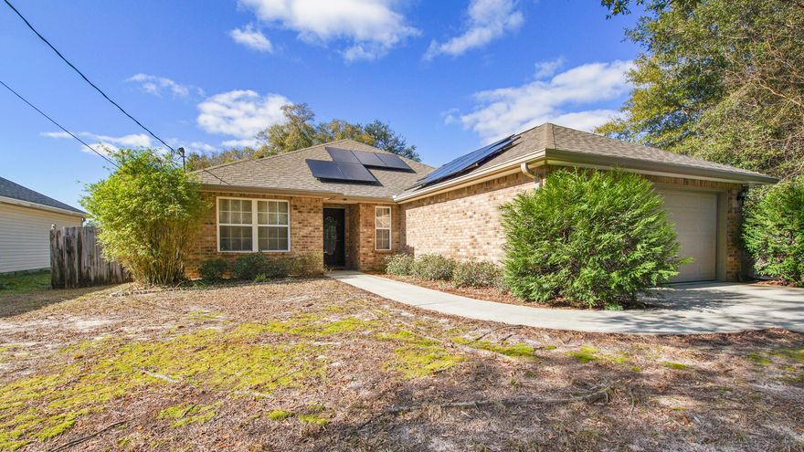 HONEY, YOU'RE HOME! South Crestview 2014-built beauty, with NO HOA! You'll be Home Sweet Home in this 2014-built easy-to-maintain gem, with low utility & insurance costs, featuring 9 and 10 ft ceilings, and encompassing 4 Bedrooms, 2 Full Baths, and a 2-Car Garage. This is one of the most southern locations in Crestview just minutes from the 7th Group and Duke Field, and a short commute to Eglin. The show-stopping Kitchen features gorgeous natural wood cabinetry, granite counters, breakfast bar, eat-in Dining Area, pantry, and stainless-steel appliances, to include a French-door refrigerator! The Laundry Room is positioned just off the Kitchen and Garage making it an ideal mudroom area too. There are French Doors leading from the Living Room out to the wood deck and large private back yard