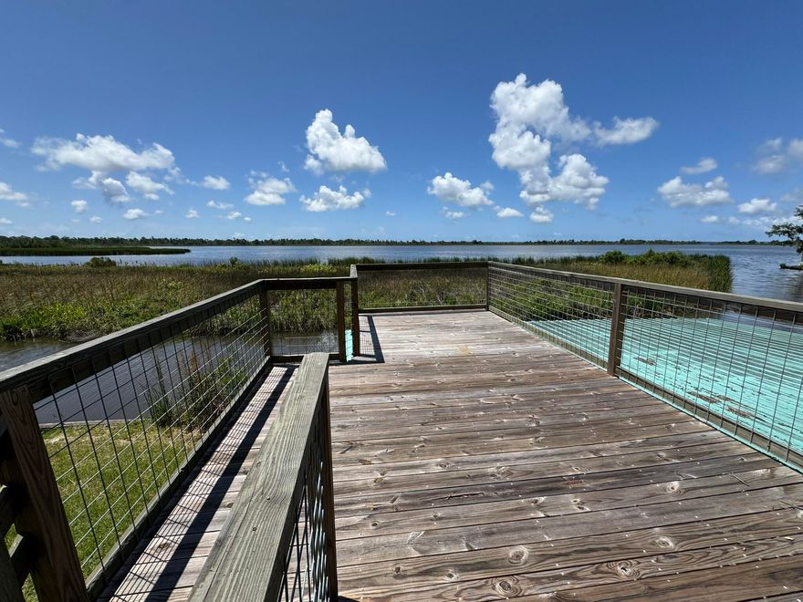 Call the owner, Benjie Holley at (334 608 8526 ) for details and showings.Waterfront living at its finest! This 2BR/2BA block home is situated directly on the bay in the desirable Pitts Bayshore neighborhood of Freeport. Enjoy breathtaking water views and easy access to the bay from your private covered boathouse, complete with a boat lift for convenience. A spacious upper-level deck on the boathouse offers the perfect spot to relax or entertain while taking in stunning sunsets and bay breezes.The home features a functional layout with two bedrooms, two full bathrooms, and an open living/dining area. Great opportunity to personalize or use as a low-maintenance coastal getaway. Ideal for boating enthusiasts, investors, or full-time residents seeking tranquil waterfront living.