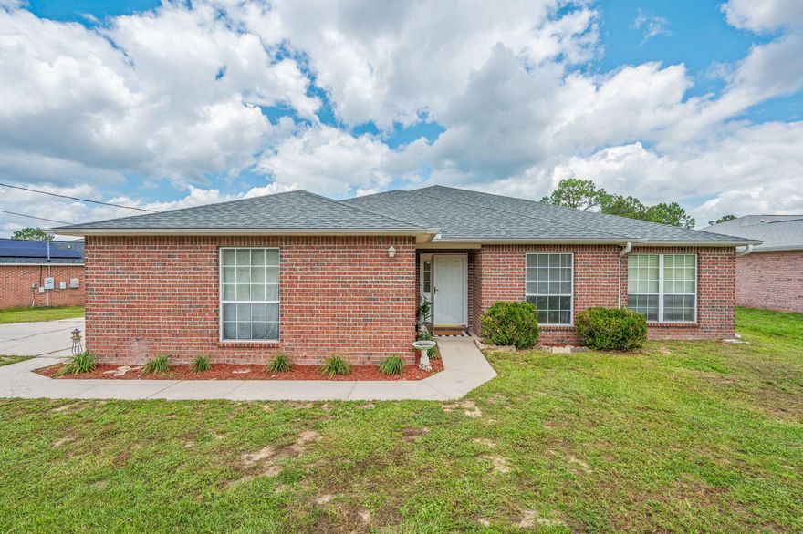 Best price per square foot for a 2,348 sq ft home in all of Crestview--seriously, go check!Yes, the carpet's seen better days, but the seller's giving you $7,500 reasons to rip it up and start fresh. On top of that, there's $7,000 in ''anyway money'' to use however you like--closing costs, rate buy-down, or that Pinterest project you've been saving for.Fall in love with the custom wood breakfast bar and that charming pot rack (you know you noticed it). Want privacy? No rear neighbors. Want lower insurance premiums? Roof replaced in 2024 and a brand-new water heater just for you. Septic drain field improvements are also in the works--because nobody wants to deal with that later.Worried about base commute? This home sits off the newly expanded PJ Adams Pkwy, with a brand-new interstate  connector coming soon to make your mornings a breeze.

Big space, smart updates, and money back in your pocket? You better move fastbefore someone else's Pinterest board beats you to it