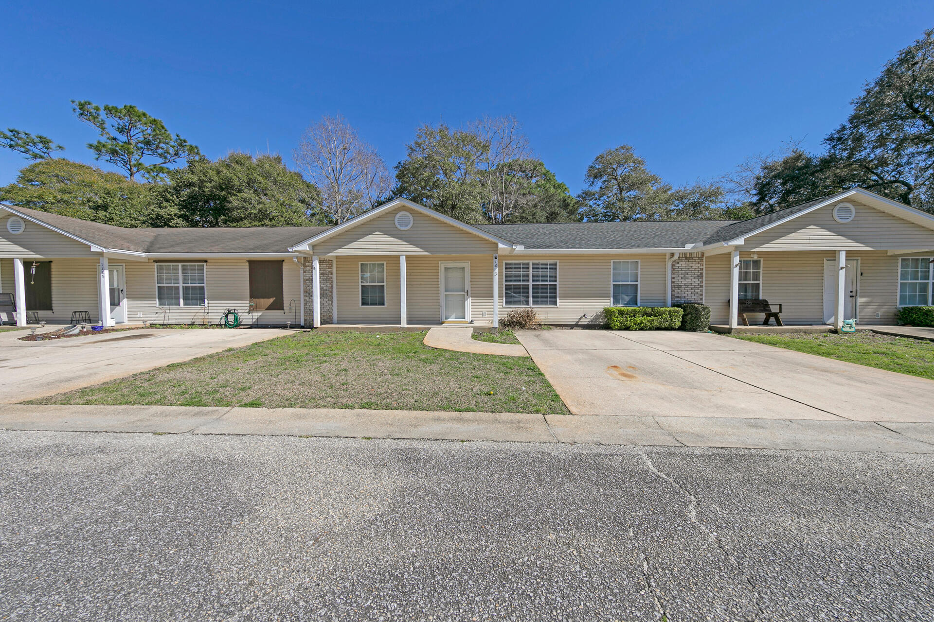 Affordable and practical. Everything about this 3BR 2BA one story townhome makes sense. Located in a quiet neighborhood conveniently close to Eglin (6 mi) and Hurlburt AFB (5 mi) in an area away from all the traffic. Enjoy open living space with a split bedroom floor plan that includes a bonus room for office, workout room or storage. Beautiful wood floors in the living room and tile floors in kitchen and bathrooms. Carpet in all the bedrooms with each room having its own walk-in closet. Additional features of the interior include built-in bookcase, breakfast bar and pantry in kitchen, laundry room with ample storage. New roof and fence in December 2022! Wonderful investment as this home can function as a great rental or even better starter home. This will not last long at this price.