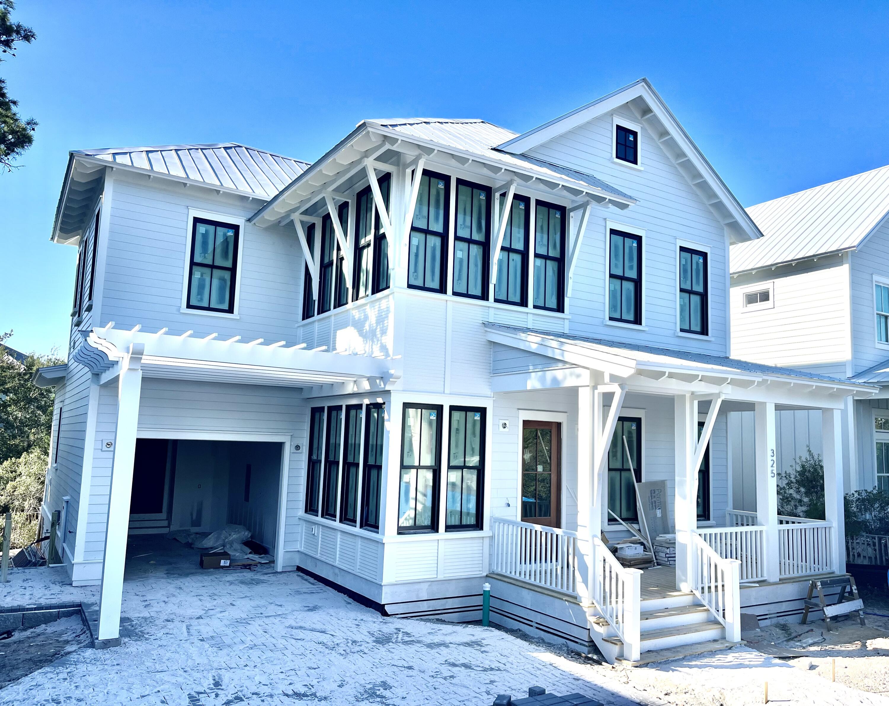 New construction in the highly desired Preserve at Grayton to be completed in November! This 2,876 sq. ft. home with a 1 car garage features 4 bedrooms, 4.5 bathrooms and a bonus room, perfect for an office or bunk beds. As you walk in the first floor, you'll be greeted by the airy staircase wrapped by a walls of windows that draw your eyes up the soaring 11' ceilings. To your right, you'll find the guest suite and to the back of the house you have the great room, which opens to an expansive screened in porch to bring the outside in, kitchen, dining area, half bath, and laundry/pantry room that leads into the garage. On the second floor you'll find the master suite, two additional generously sized bedrooms with private bathrooms, the bonus office/bunk room, second laundry room and rec