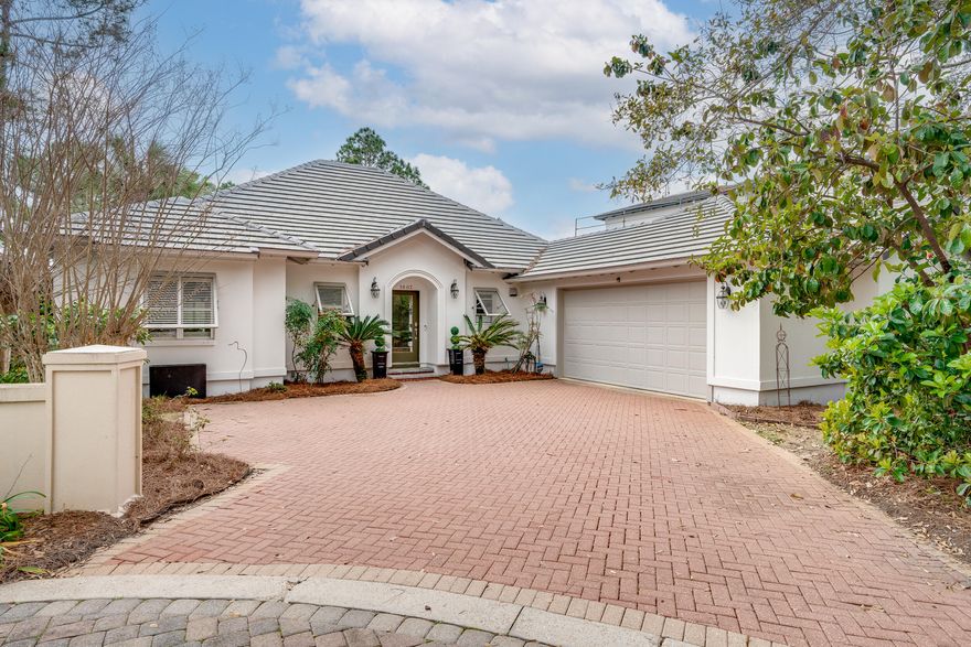 Welcome to this charming, single-level home, nestled in the heart of Sandestin's Del Mar neighborhood.This delightful property boasts a newly painted white stucco facade, adorned with a brand new darkgray concrete-tile roof. Among other plantings, beautiful, mature azaleas, camellias, palm trees, andcrape myrtles, greet you as you drive toward your two-car garage, having set a warm and inviting scene.Step inside, and you'll find the living room filled with bright, natural light from expansive windows andsliding doors adorned with custom plantation shutters that add a touch of coziness. Open the doors toenjoy your screened porch, an idyllic, private retreat for napping, reading, or eating. The living room isspacious with a vaulted ceiling, a gas fire