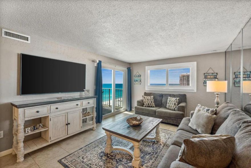 RECENT APPRAISAL REPORT from Aug 29 2024 OVER the current LISTED PRICE in docs. This 3-bed, 2-bath unit is beautifully furnished and decorated.  You and your guests will love the balcony view of the Gulf, with balcony access from both the living room and master bedroom. The updates are top-notch: soft close cabinets and drawers, quartz countertops, brand new backsplash, tile flooring, quality beach themed furnishings, and a remodeled master bath with a new vanity and tile shower.  It's fully furnished and ready to be your new beach home or rental unit!