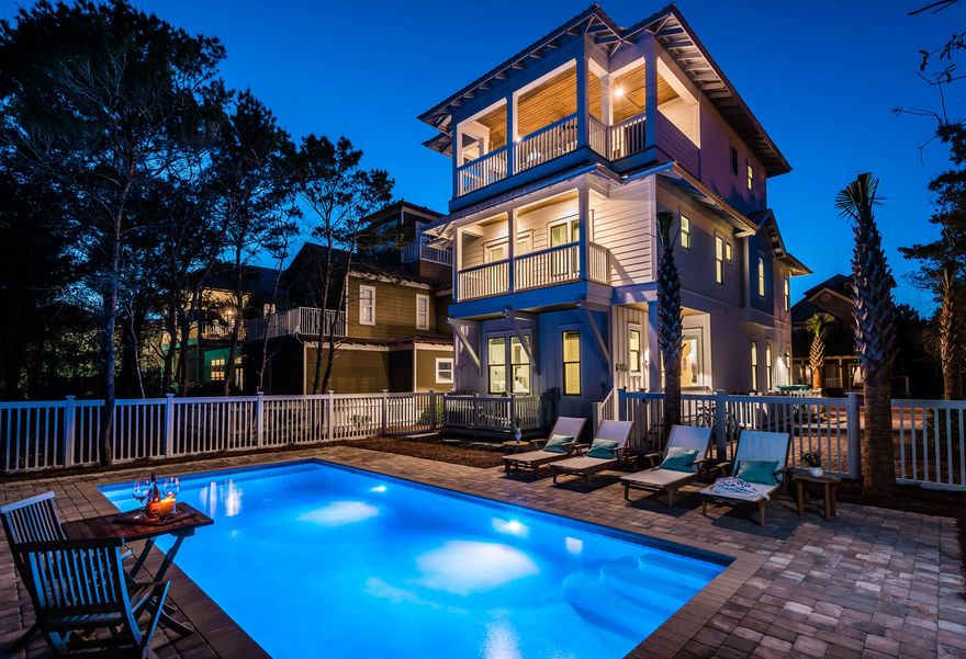Beautiful coastal home located in Seacrest featuring 5 bedrooms and 5 full/2 half baths spread over three stories. The main kitchen and living spaces are open concept with lots of natural light. There is a bedroom on the main floor and the primary bedroom, bunk room and additional bedroom are located on the second floor. The third floor boasts a second primary brand a bonus area with 1/2 bath featuring doors that lead out to the outdoor kitchen. The outside living areas include 2 balconies off bedrooms, a top deck with built in grill, dining area and rope bed. The expansive private pool with entertaining and lounging areas is icing on the cake. The home is situated closely to the Seacrest subdivision lagoon pool and the beach tram service pick up is across the street