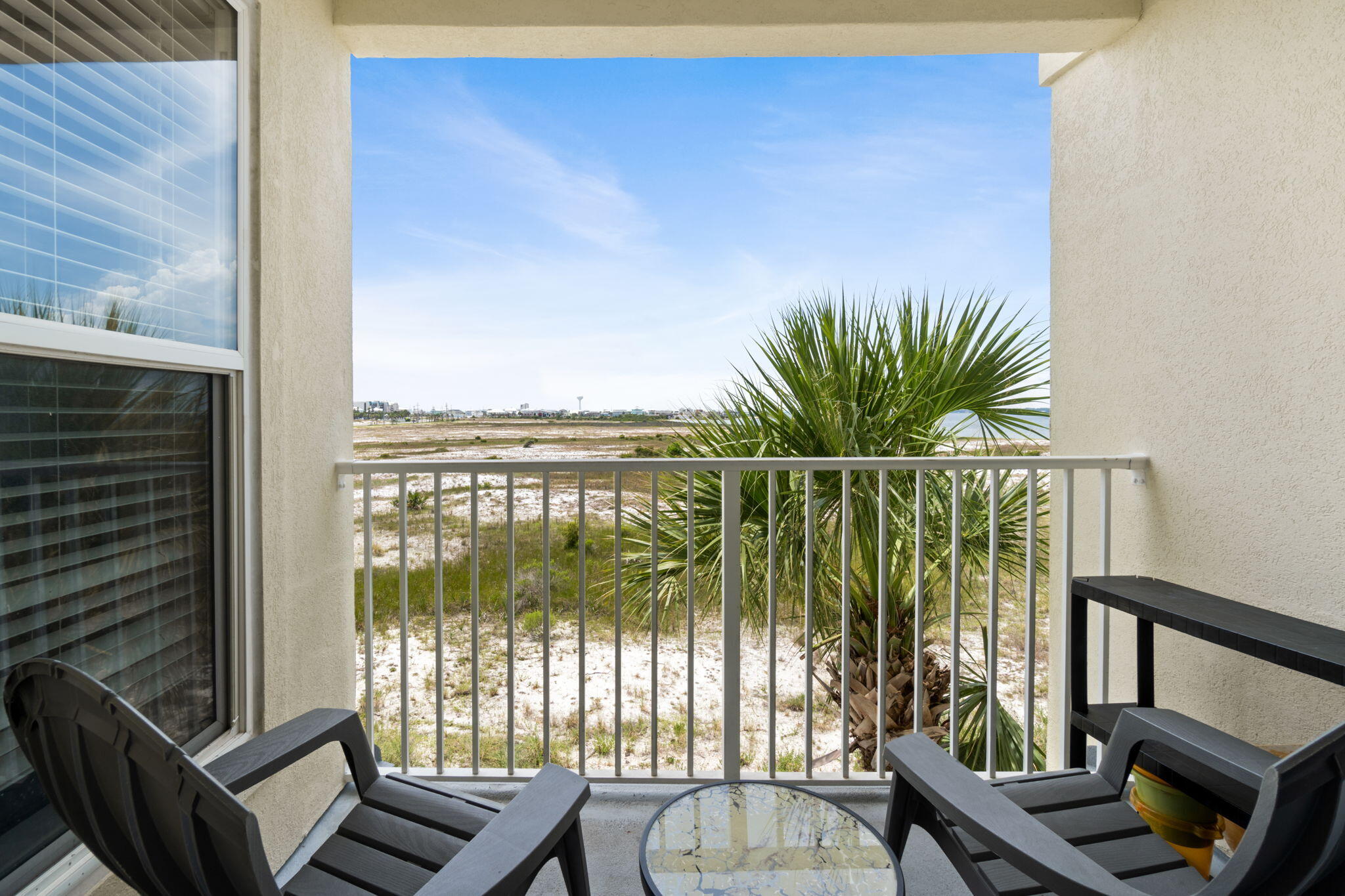 GULF AND SOUND VIEWS in this adorable 1 bedroom/2 bathroom condo. Inside you will find sleeping for 6-8 guests; a large kitchen with breakfast bar and a private balcony with views of the Gulf and the Sound. The unit boasts hallway bunk beds for the little ones and stackable washer/dryer. All furnishings, appliances and decor stay. Outside is a nice community pool with showers, restrooms and a grilling area. Enjoy the Public Beach just 800 feet away. Bicycle, jog or walk on the newly paved sidewalks along Gulf Boulevard. Restaurants, bars and shopping are all within walking distance. Best yet? Gulf Island condominiums are situated right on Gulf Blvd so set up your chairs and watch the Mardi Gras or Christmas Parades! 2024 Rental Income $21,000. 2025 Rental income $9500 to date. Water Heater 2005 and HVAC 2021. The Structural Integrity Report is complete; the repairs are all complete and all special assessments are paid!