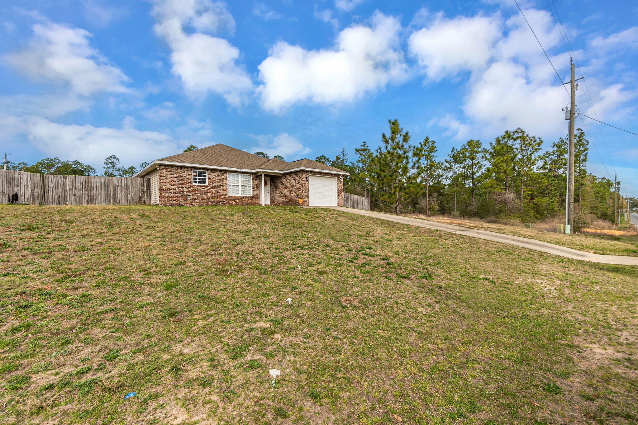 VA Assumable 3.125%! Don't miss this beautifully updated 3-bedroom, 2-bathroom patio home in a peaceful rural setting of Crestview! This home features newer flooring throughout, HVAC system was replaced in 2022, the water heater was replaced in 2025 giving you peace of mind for years to come.Conveniently located off Hwy 90, with quick access to I-10, shopping, dining, and local attractions like the Emerald Coast Zoo.Seller is paying for title--making your home-buying process even easier!