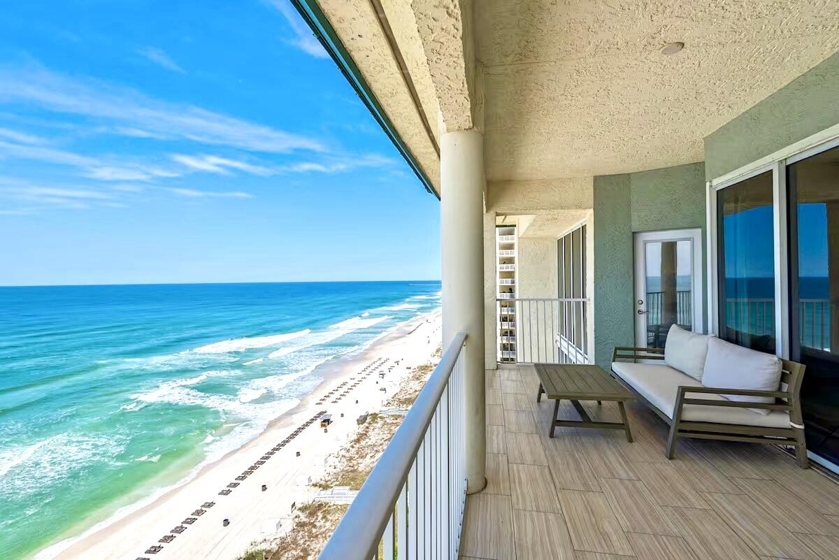 The ''Crown Jewel''! Once-in-a-lifetime opportunity to own the best condo in the most highly sought-after resort along the Gulf! The Penthouse-end unit, with spectacular views both East & West, where every room fronts the beautiful Emerald-Green Gulf! 1400 feet of private white sugar-sand beach & 3 heated pools, including a huge 7500 sq ft lagoon pool with waterfalls & tropical palm-laden island & Tiki bar. Great investment opportunity-booked solid year after year, plus many family vacations. Owner financing too, at low rates! This spacious 3 BR, 3 bath condo has been meticulously renovated & remodeled by the professional designer-owner, making it one of the most attractive units in the resort. Every room offers breathtaking floor-to-ceiling Gulf-front views, with private balcony access. Upgrades include new Quartz Countertops, custom tile backsplash, new LVP flooring, new lighting, new plumbing fixtures, stainless steel appliances, built-in bookcases, and a Master Ensuite featuring both a tub and separate shower, double vanities and linen closet. Vaulted ceilings are also unique to this luxurious Penthouse. One of the Bedrooms is a separate secondary Master suite, with wet bar, private bath, a 2nd laundry room and a private Gulf-front balcony. Long Beach Resort unit 1406 is a corner unit in the highly sought after ''six stack'' which is the only Western Sunset facing corner Penthouse and offers extra privacy, extra balcony space, and an incredible view of the sunset due to its unobstructed western view corridors. Long Beach Resort also has the longest private beach, with low condo density due to every condo being designed parallel to the beach, instead of the typical shotgun floorplan; and only being a 14-floor height instead of other typical 30-floor high-density condos. Amenities galore with numerous Polynesian pools, 3 whirlpools, bar/grill poolside, self-serve grills, fitness center, beach vendor services such as chairs, jet-ski and parasail, and a gated security-entry with an abundance of main-level parking. Long Beach Resort is one of the most popular resorts in Panama City Beach, with a central location close to great restaurants and shopping. Long Beach is always in high demand due to its stellar rental returns and close proximity to sporting complexes, conference centers, shopping, dining, and entertainment options as well as being a short drive from a major regional airport
Unlike other resorts, Long Beach offers a large open-air parking lot that allows guests to park to in front of their tower, and to load & unload under cover at the door. Long Beach Resort is a true piece of Panama City Beach history!
Long Beach Resort will soon be upgraded with new renovated stucco exteriors, balcony railings, etc during the winter months ahead. Therefore, the owner will pay half of the HOA fees for the next two years, when the HOA fees are expected to be reduced accordingly.
A great opportunity to own this unique condo, at this low price, with low interest owner financing.