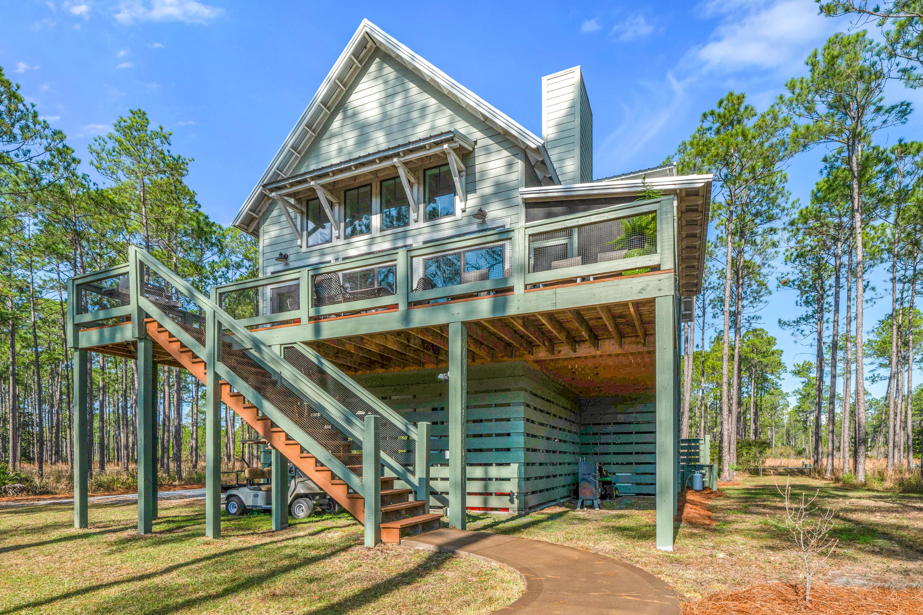 Welcome home to Rivercamps on Crooked Creek! This home sits on 1+ acre and features beautiful architectural design along with a chic interior overlooking one of the many lakes. This home boasts 3bd/2.5ba, abounding with upgrades inside and out including wide plank hickory floors, quartz countertops, stainless steel appliances, floor to ceiling windows and 3 large porches to enjoy the fabulous views! The Master is on the main floor and 2 large additional bedrooms upstairs, along with a large open loft with contemporary wire railing allowing natural light to shine through with a beautiful view of the lake. Developed by St. Joe, Rivercamps is a one of a kind luxury community and wildlife sanctuary, encompassing 1500 acres of pine forest preserve and fewer than 450 homes