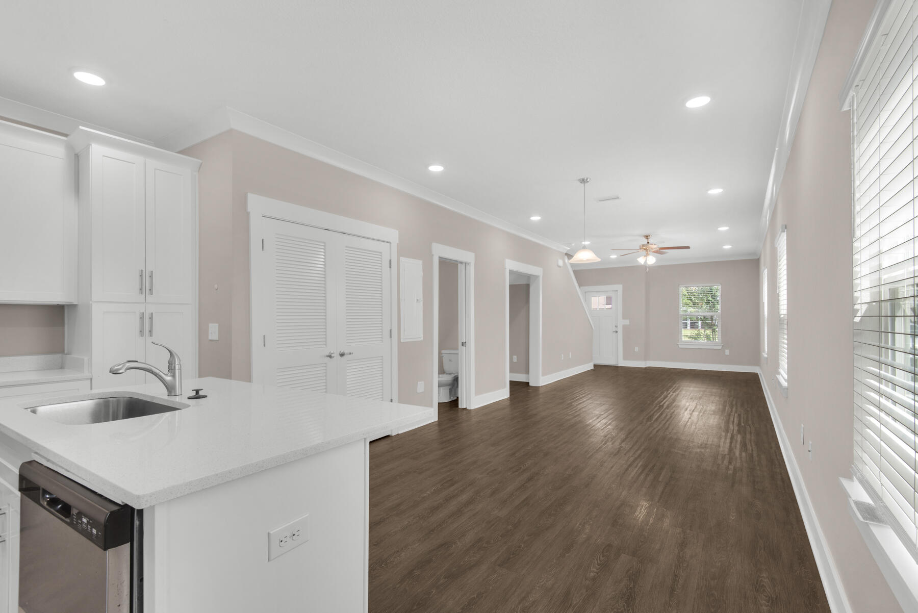 3 bedroom, 2.5 bath end unit town home with upgrades and a community pool! This lovely home is across the street from an elementary school, just down the road from a Publix shopping center, and a short, easy commute to the sugar sand beaches and emerald waters of 30A and South Walton. It has fresh, neutral paint and all LVP flooring throughout (no carpet). The open floor plan on the first level includes a nice size living room with nook, eat-in kitchen with breakfast bar, gorgeous counter tops, plenty of counter/cabinet space, stainless appliances (including a flat cook top stove), as well as a half guest bath with pedestal sink and a screened-in back porch. Property is Owner-managed so no dealing with third party rental agencies!Pro deep cleaning and a fresh coat of paint. M