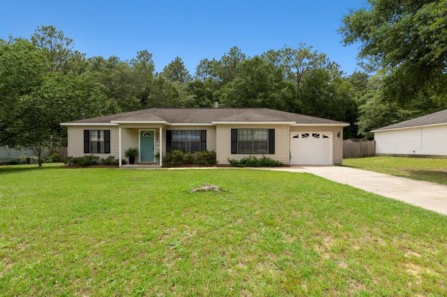 NEW ROOF COMING SOON!Welcome home... This 3 bed, 2 bath, 1,306 square foot is conveniently located in central Crestview! This 1 owner, freshly painted & well maintained traditional home features a split floor plan design. New stain master vinyl flooring in main living areas. A spacious living room with vaulted ceilings & a wood burning brick fireplace! A extra wide galley kitchen features ample solid wood cabinetry, double well sink with disposal & lots of usable counter space! Large pantry with plenty of shelving for storage. Enjoy your morning coffee in your breakfast nook overlooking your beautiful back yard! A tree lined, fully privacy fenced back yard makes you forget your in town! Large back patio great for grilling and enjoying Florida evenings.(continued)