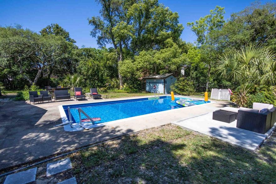 RARE FIND! LARGE LOT, GUEST HOUSE, & POOL! Located within 15 min of Eglin AFB/Hurlburt Field and 25 min to Duke Field. Main home is 1945 sq ft and features 3 bedrooms, 2 full baths and an office/additional guest room.  Main home has all stainless appliances and washer/dryer! Master features fully renovated ensuite & large walk in closet. Guest house is 887 sq ft and features 2 bedrooms & 1 bath with stackable washer/dryer in unit and SEPARATE entrance from rear of property with private driveway. Low utilities! - Sprinkler system runs off well, solar panels, brand new roof & gas hot water heater. Pool service included in lease. Washer/dryer sets are non-warranted by owner. (Home/Guest Home are also being offered for lease individually at $2800 Main Home/$1500 Guest Home).