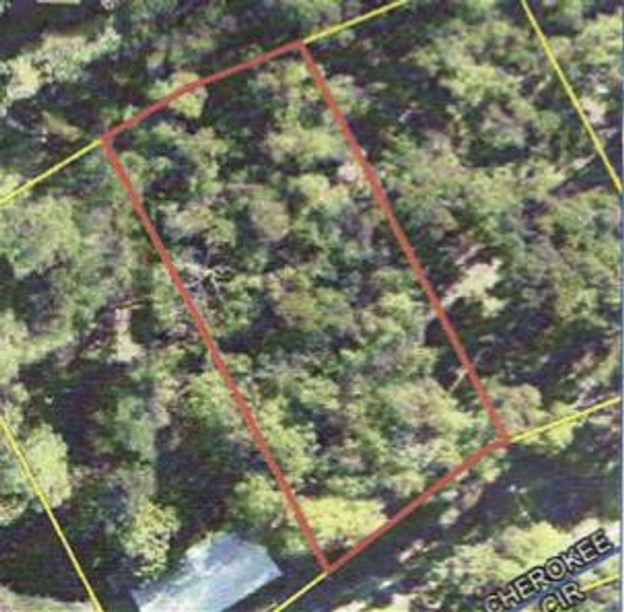 Undeveloped Parcel 0.334 acres.  Lots of potential for a small house project nestled between the old growth oak trees and gently sloping to  shoreline of Juniper lake.  Fishing, boat access, and floating dock access are possibilities.  Very quiet rural access trail (Cherokee Circle) with an Old Florida feel and surrounded by a North Walton country atmosphere.  One of the last undeveloped waterfront lots on Cherokee Circler.  Waterfront community park, with boat ramp, bathrooms and picnic table pavilions just a short distance down the paved country road.  All information deemed accurate but purchasers should verify all of importance to them.Survey is available.