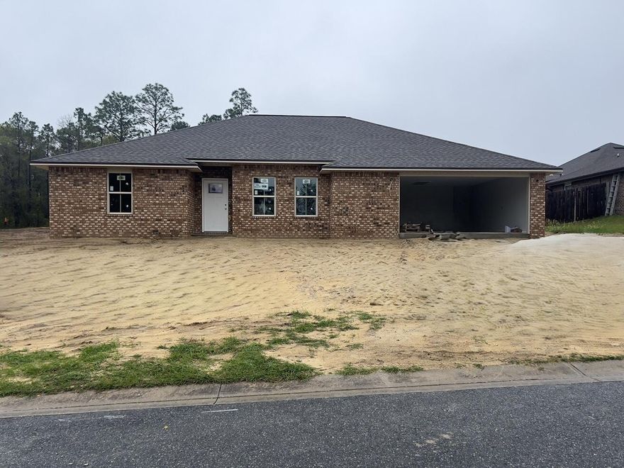 UNDER CONSTRUCTION - Porcelain Plank Tile & Carpet - BRAND NEW BRICK HOME - SOUTH OF I-10 - 4 Bedrooms, 2 Baths, QUARTZ Countertops in Kitchens & Baths, Soaring Ceilings in the Main Areas + Auto Garage Door Opener. Large Living Room, Breakfast Bar, Pantry, & Spacious Laundry Room. Master Suite, Double Quartz Top Vanity, LARGE SHOWER, Walk-in Closet. 3 Additional Bedrooms & 2 Car Garage.